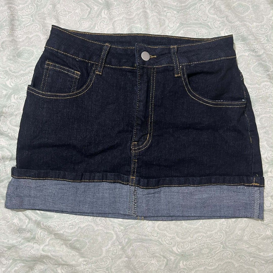 Dark Wash Denim Mini Skirt with Cuffed Hem (Category: Skirts) located in Cebu City. Submitted by ibyang_blgn (Listing ID 1450176423, Image 1). Description: - Dark wash denim mini skirt - Cuffed hem detail - Classic five-pocket styling - Button and zip closure - Made in China - Size M.