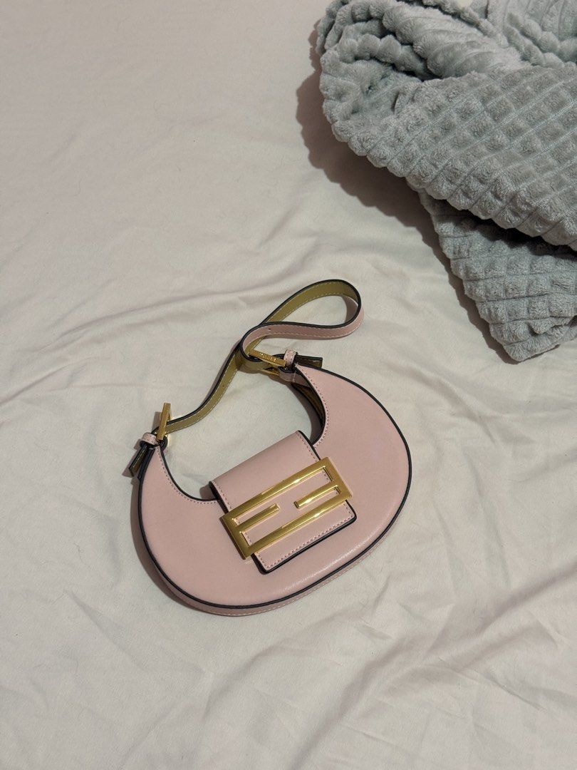 Fendi Pink Monogram Mini Baguette Shoulder Bag (Category: Luxury Bags & Wallets) located in Manila. Submitted by tuchiichi (Listing ID 1450257955, Image 1). Description: - Super cute Fendi mini bag - Pink leather with gold hardware - Iconic FF logo on front flap - Fendi Roma branding inside - Adjustable strap - Perfect for night out or everyday use - can do lalamove - gcash payment or gotyme.