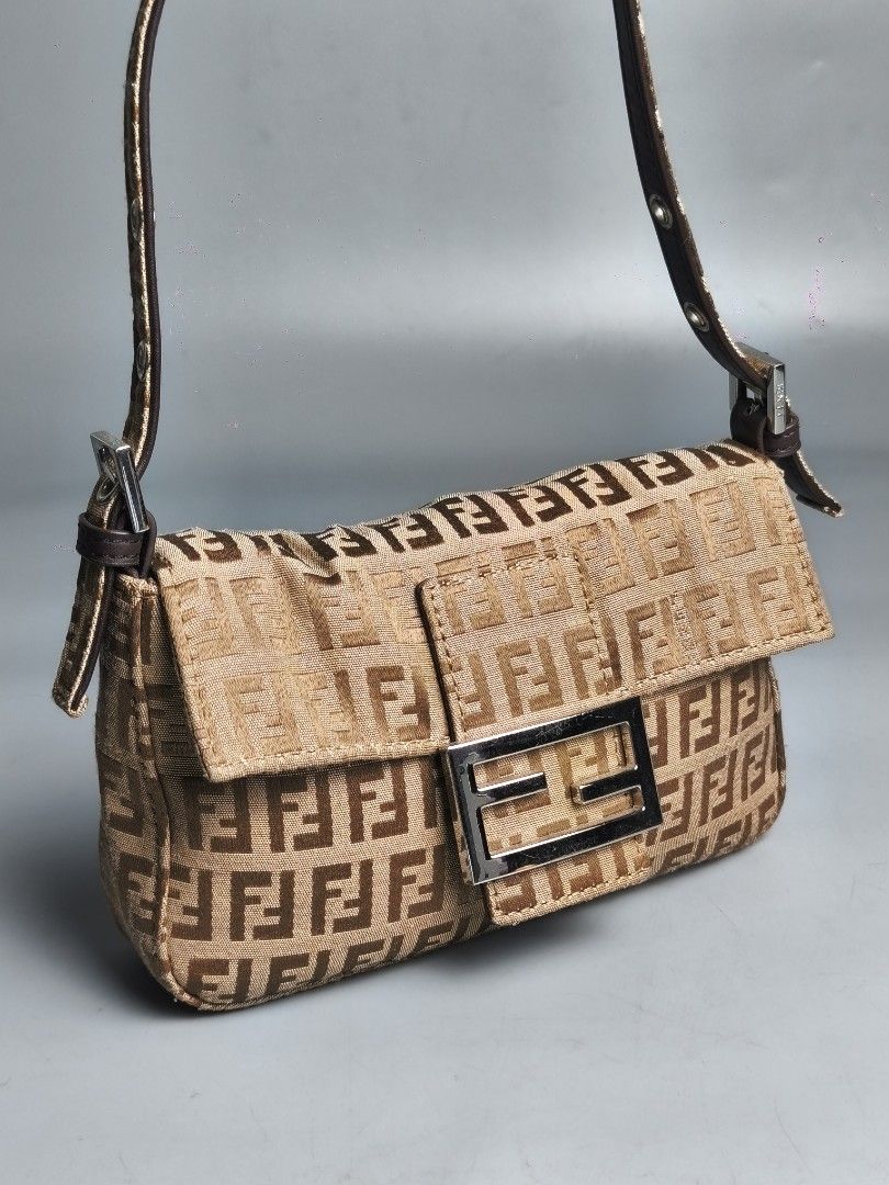 Fendi Zucchino Mini Baguette (Category: Luxury Bags & Wallets) located in Bulacan. Submitted by 4kcollection (Listing ID 1450140804, Image 3). Description: Fendi Zucchino Mini Baguette Pre-loved from Japan 🇯🇵 Very Good Condition Size: Small FF Zip Minimal sign of Use Not Coded No Rubs Dm for sure buyer 📩 MOP: Gcash / Maya / BPI Courier: J&t / Lbc / Lalamove Location: SJDM Bulacan.