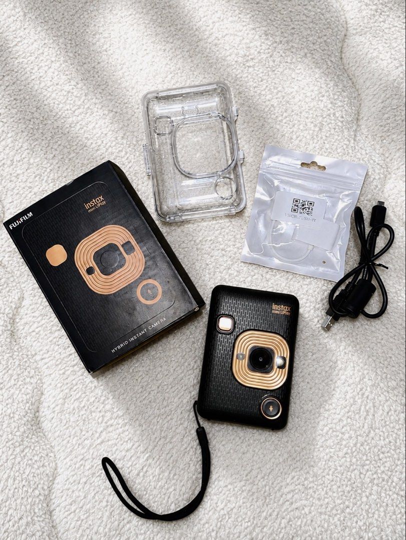 Fujifilm Instax Mini Liplay (Category: Cameras) located in Manila. Submitted by cjmelendrez (Listing ID 1450294575, Image 1). Description: This is my personal instax camera. I’m only selling it because I really need extra funds for my tuition fees. 📷 FUJIFILM INSTAX MINI LIPLAY ✨ Camera + smartphone printer in one ✨ Bluetooth connectivity ✨ Rechargeable battery ✨ Can print your photos saved on your phone (thru app) ✨ Can print photos with voice 