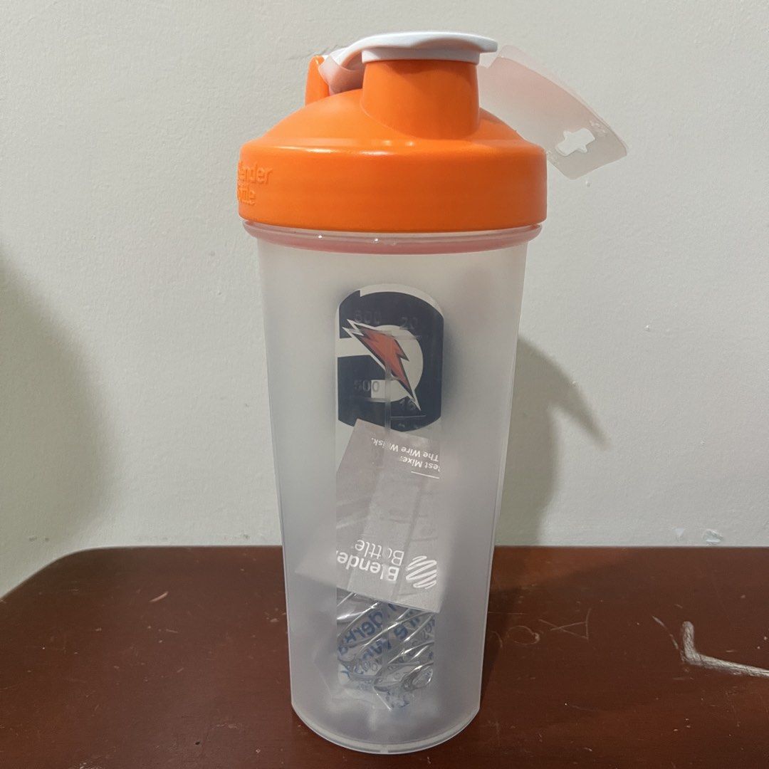 Gatorade Blender Bottle Shaker (Category: Water Bottles & Tumblers) located in Legazpi City. Submitted by reyshop23 (Listing ID 1450165169, Image 2). Description: - Orange and white Gatorade shaker bottle - Made by Blender Bottle - Features the Gatorade logo - Comes with a mixing ball for smooth shakes - Ideal for protein shakes, pre-workout, or any beverage - Convenient and easy to carry on the go.