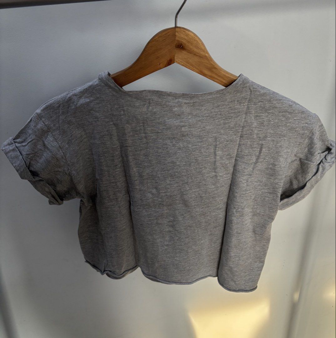 Grey Cropped Graphic T-shirt (Category: Shirts) located in Mandaue City. Submitted by offthehanger26 (Listing ID 1450185602, Image 2). Description: - Bought in the US - Favorite cropped t-shirt! - Outer Banks-esque piece - Features a fun ice cream truck graphic with 'California' text.