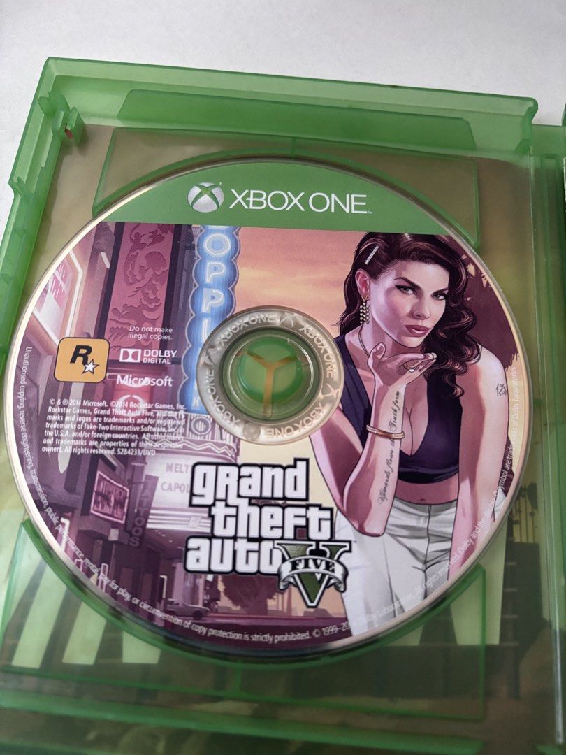 GTA V - Xbox One (Category: Xbox) located in Baguio. Submitted by a.eoro (Listing ID 1450150928, Image 2). Description: Grand Theft Auto V for Xbox One •Little to no scratches •Guide booklet • Lost the map • I accept returns, if not working • RFS: need funds 🙏.
