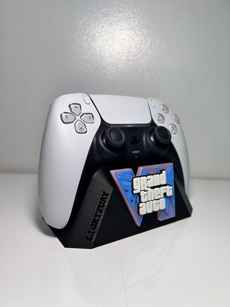 GTA VI PS5 Controller Stand (No Controller) (Category: Controllers) located in Manila. Submitted by geeelll03 (Listing ID 1450288829, Image 2). Description: - 3D Printed Cool stand for your PS5 controller. - Features the iconic Grand Theft Auto VI logo. - Perfect for displaying your controller. - Made from durable, high-quality material. - A must-have collectible for any GTA fan!.