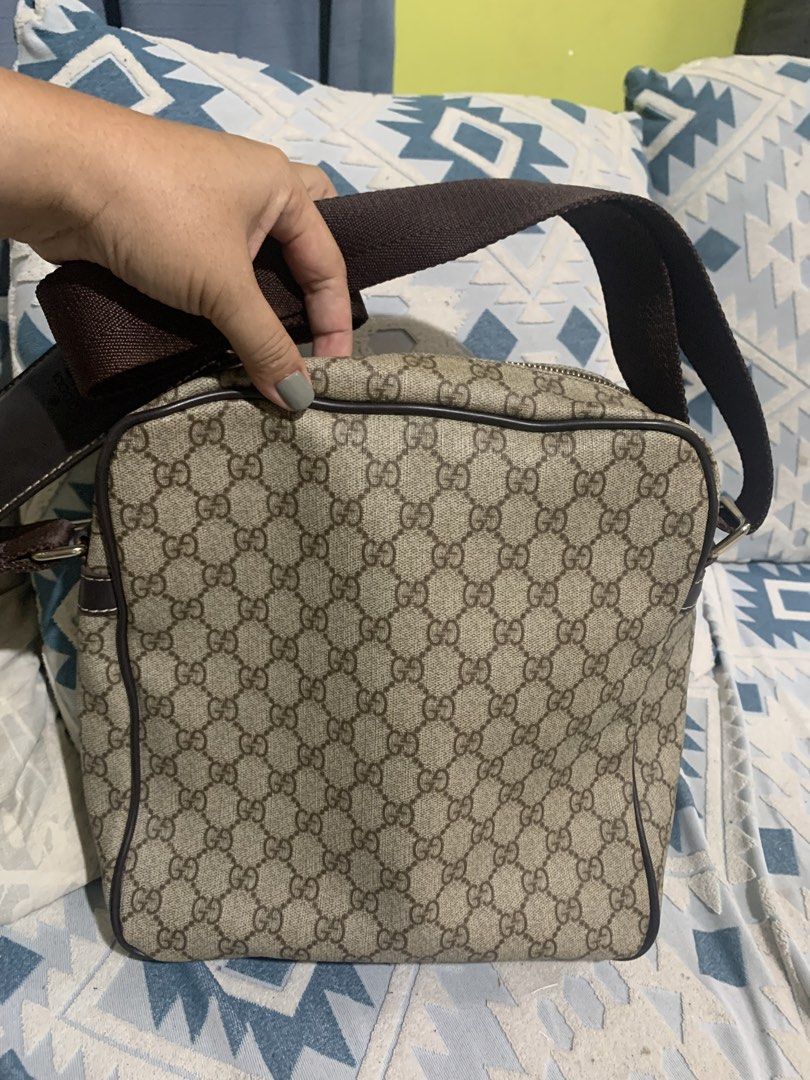 Gucci Monogram Crossbody Bag (Category: Luxury Bags & Wallets) located in Liloan. Submitted by jinalyns (Listing ID 1450299035, Image 2). Description: Gucci crossbody bag - Classic GG monogram canvas - Brown leather trim and strap - Secure zipper closure - Interior pocket for essentials - Perfect for everyday use.