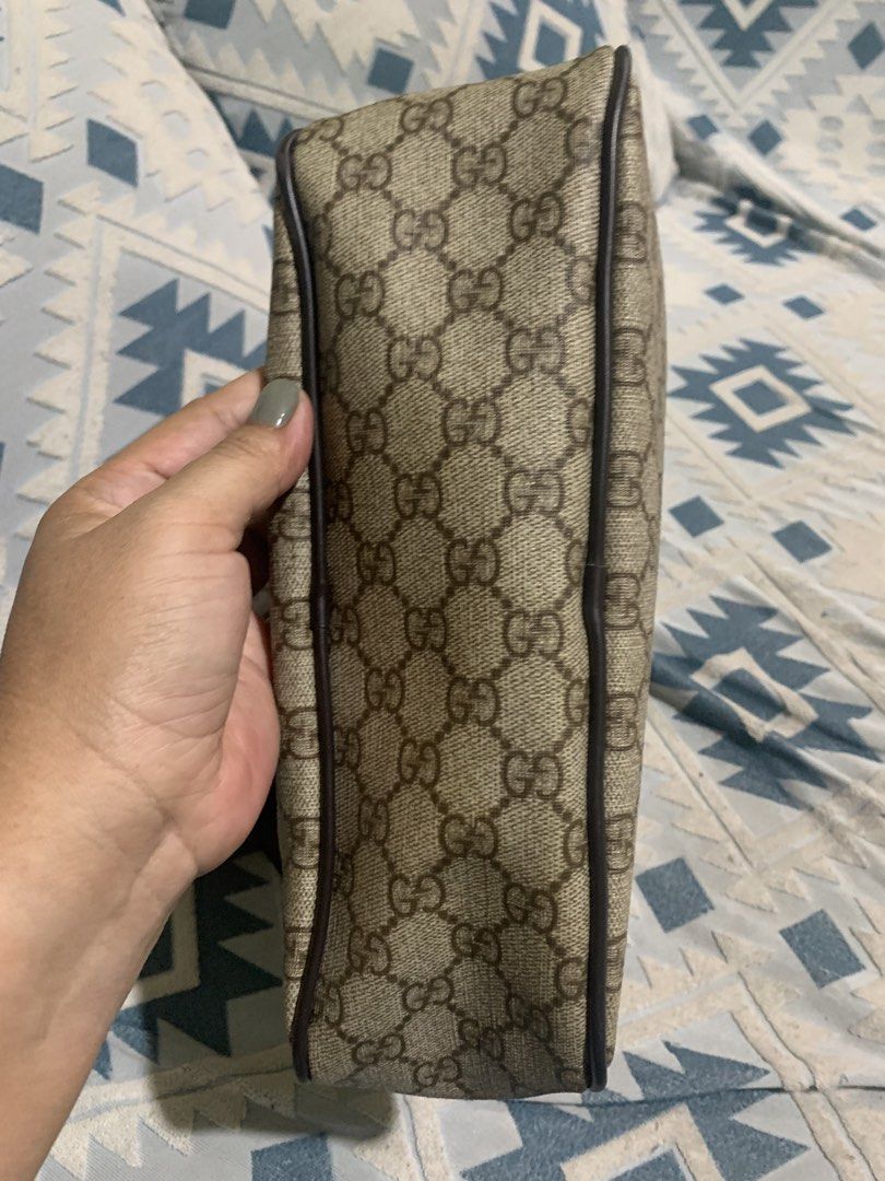 Gucci Monogram Crossbody Bag (Category: Luxury Bags & Wallets) located in Liloan. Submitted by jinalyns (Listing ID 1450299035, Image 3). Description: Gucci crossbody bag - Classic GG monogram canvas - Brown leather trim and strap - Secure zipper closure - Interior pocket for essentials - Perfect for everyday use.
