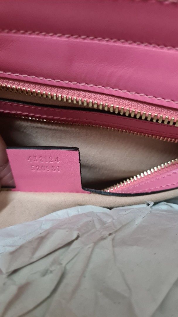 Gucci Pink Leather Embossed Top Handle Bag (Category: Luxury Bags & Wallets) located in Manila. Submitted by lc_declut (Listing ID 1450150956, Image 3). Description: - Authentic Gucci bag - Lovely pink shade - Signature GG embossed leather - Detachable shoulder strap - Gold hardware details - Dust bag included - Versatile for everyday or special occasions.