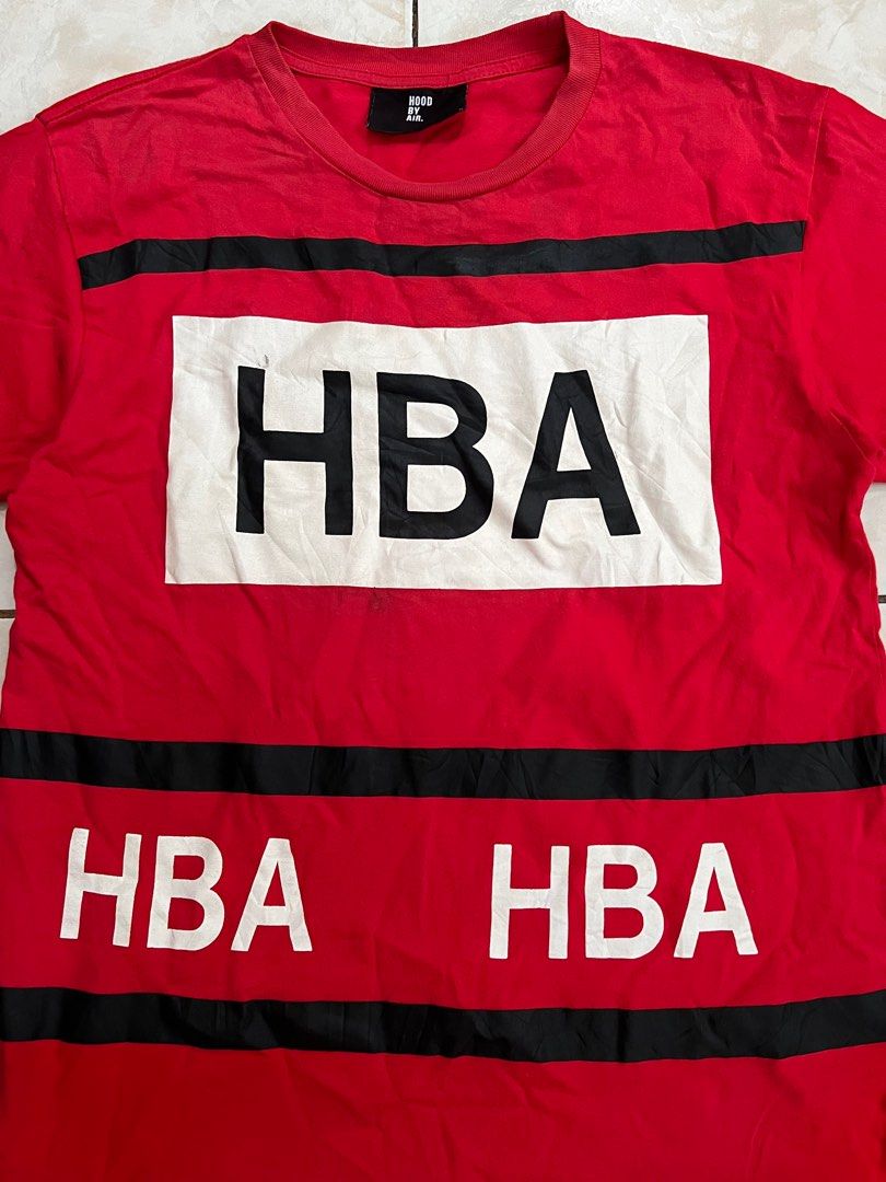 HBA Red Graphic T-Shirt Size M (Category: Tshirts & Polo Shirts ) located in Quezon City. Submitted by dayothrift_ph (Listing ID 1450198337, Image 2). Description: - Red HBA t-shirt with eye-catching graphic print. - Features the iconic 'HBA' logo prominently on the front. - Bold '69' graphic on the back for added style. - Subtle '9' detail on both sleeves. - Estimated size Medium (M). - Ideal for everyday casual wear..