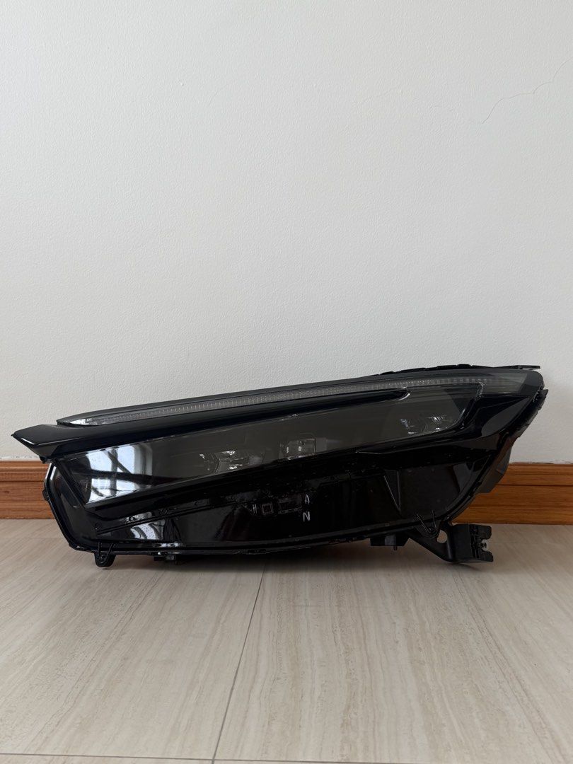 Honda CRV Hybrid Headlight (driver side) (Category: Body Parts and Accessories) located in Manila. Submitted by francispena (Listing ID 1450155873, Image 2). Description: Driver side headlight - Honda CR-V Hybrid 2024 Reason for selling: Extra stock, had scratches and Part of the replaced items in Casa 100% working, money back guarantee if not working Casa price: 30k My price: 20k 95% looks good, only minor scratches that can be buffed.