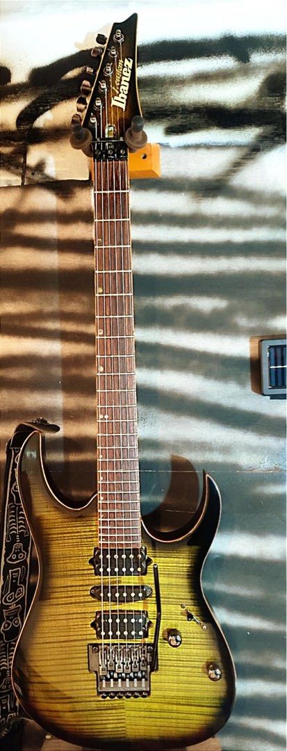 Ibanez J. Custom RG1880 (Category: Musical Instruments) located in Manila. Submitted by 12tonemusicstudioph (Listing ID 1450308411, Image 1). Description: - Ibanez J. Custom electric guitar - Stunning flame maple top with sunburst finish - Dual humbucker pickups for powerful sound - Floyd Rose tremolo system for dive bombs and vibrato - Fast, smooth neck ideal for shredding - Perfect for rock and metal music genres - Includes a cool skeleton-them