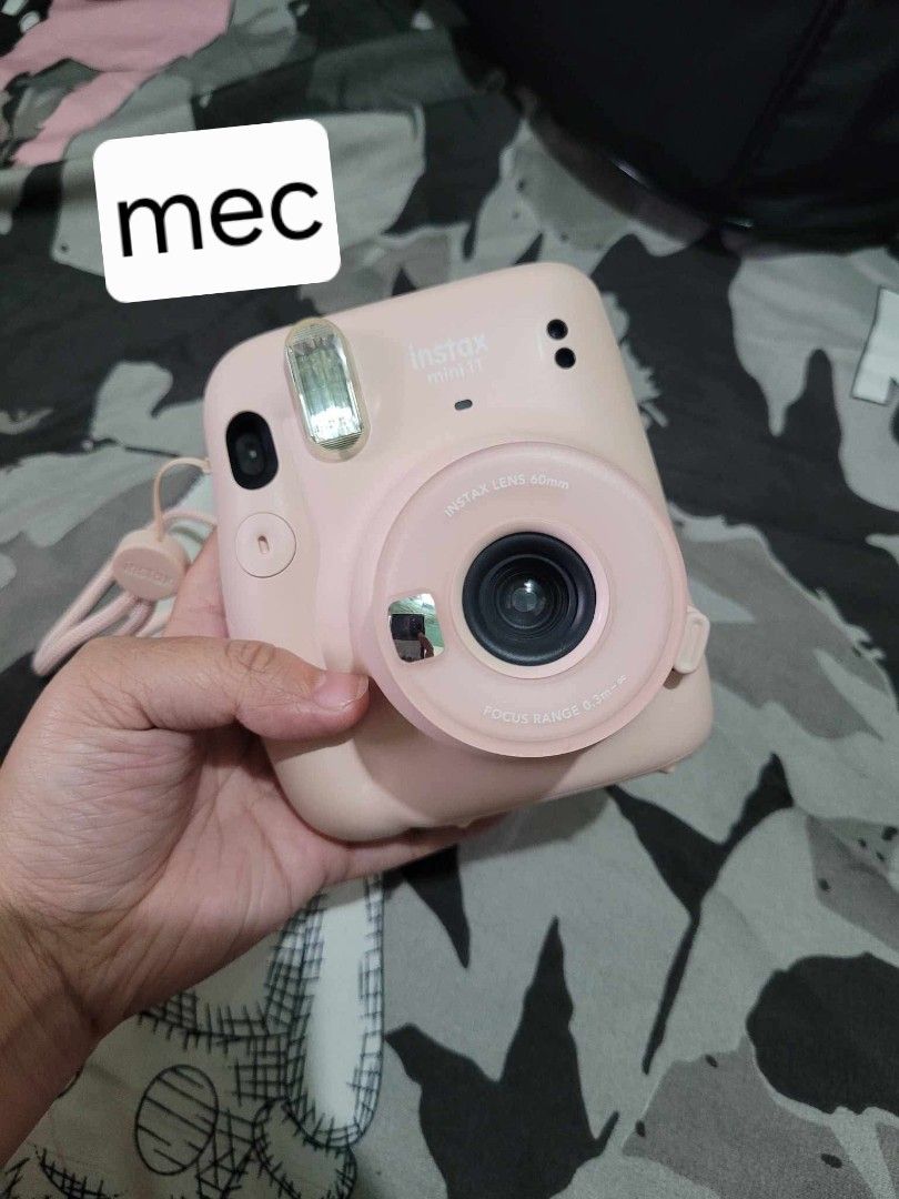 Instax Mini 11 (Category: Cameras) located in Pasig City. Submitted by meccvelasco (Listing ID 1450315105, Image 1). Description: Good condition. No film included. With Silicone Case..