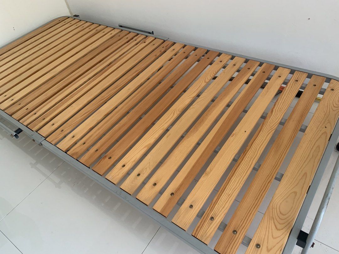 JAPAN Wooden Single Folding Bed Frame HEAVY DUTY (Category: Bed Frames & Mattresses) located in Las Pinas. Submitted by rusc.rusc (Listing ID 1450193130, Image 2). Description: JAPAN Wooden Single Folding Bed Frame HEAVY DUTY 36x75” Philam Village Las Pinas.