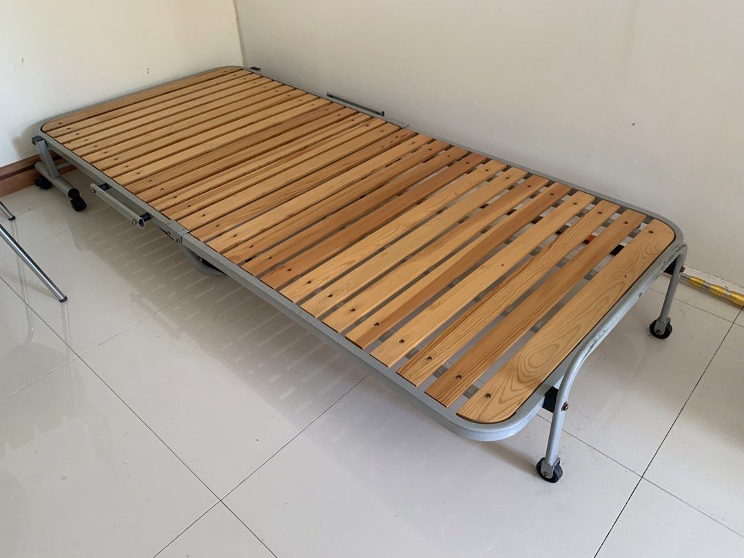 JAPAN Wooden Single Folding Bed Frame HEAVY DUTY (Category: Bed Frames & Mattresses) located in Las Pinas. Submitted by rusc.rusc (Listing ID 1450193130, Image 3). Description: JAPAN Wooden Single Folding Bed Frame HEAVY DUTY 36x75” Philam Village Las Pinas.