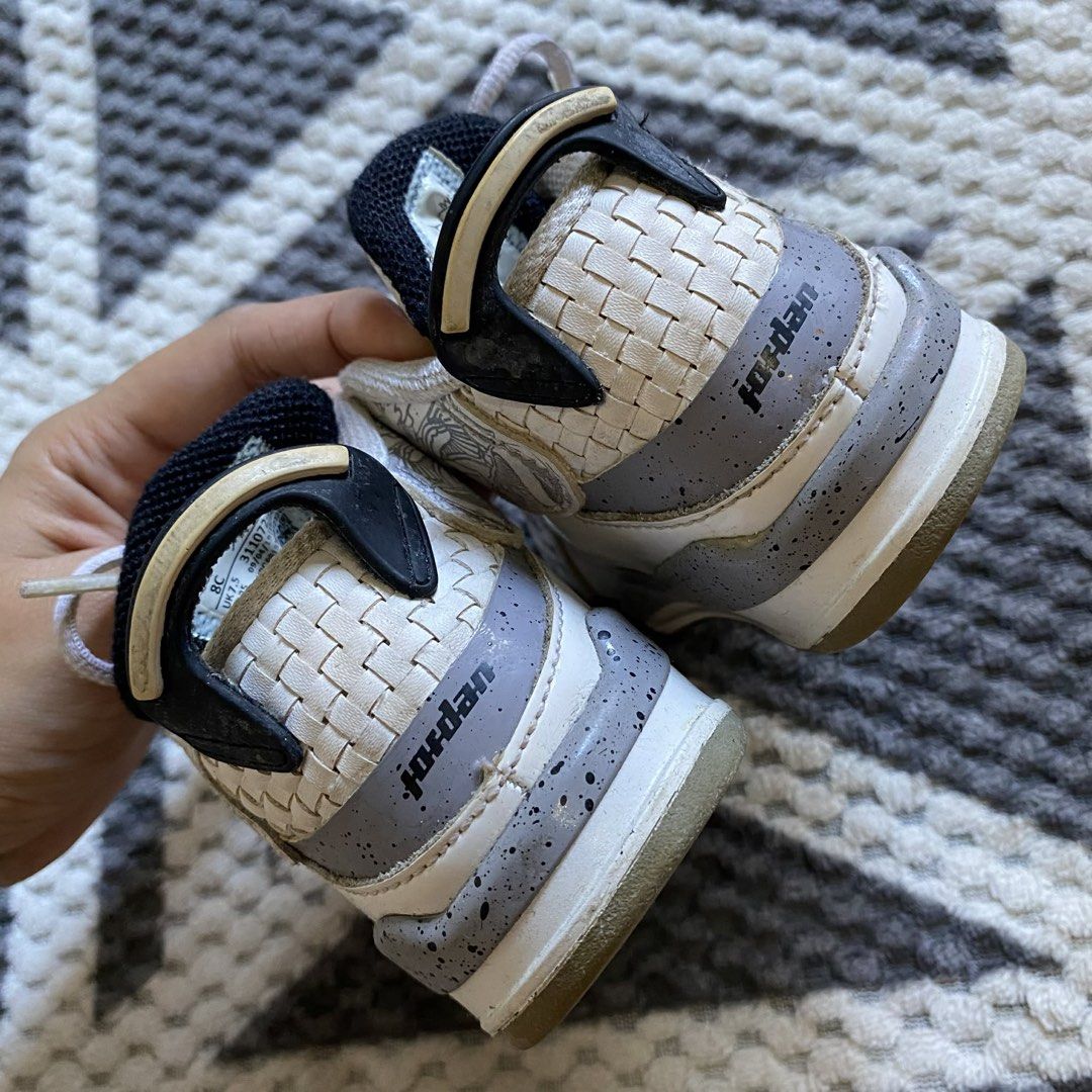 Jordan Kids' Sneakers Size 8C (Category: Babies & Kids Fashion) located in Iloilo. Submitted by declutterbykid (Listing ID 1450146004, Image 2). Description: - White Jordan sneakers for kids - Grey and black accents - Iconic Jumpman logo - White laces - Ideal for everyday wear Negotiable .