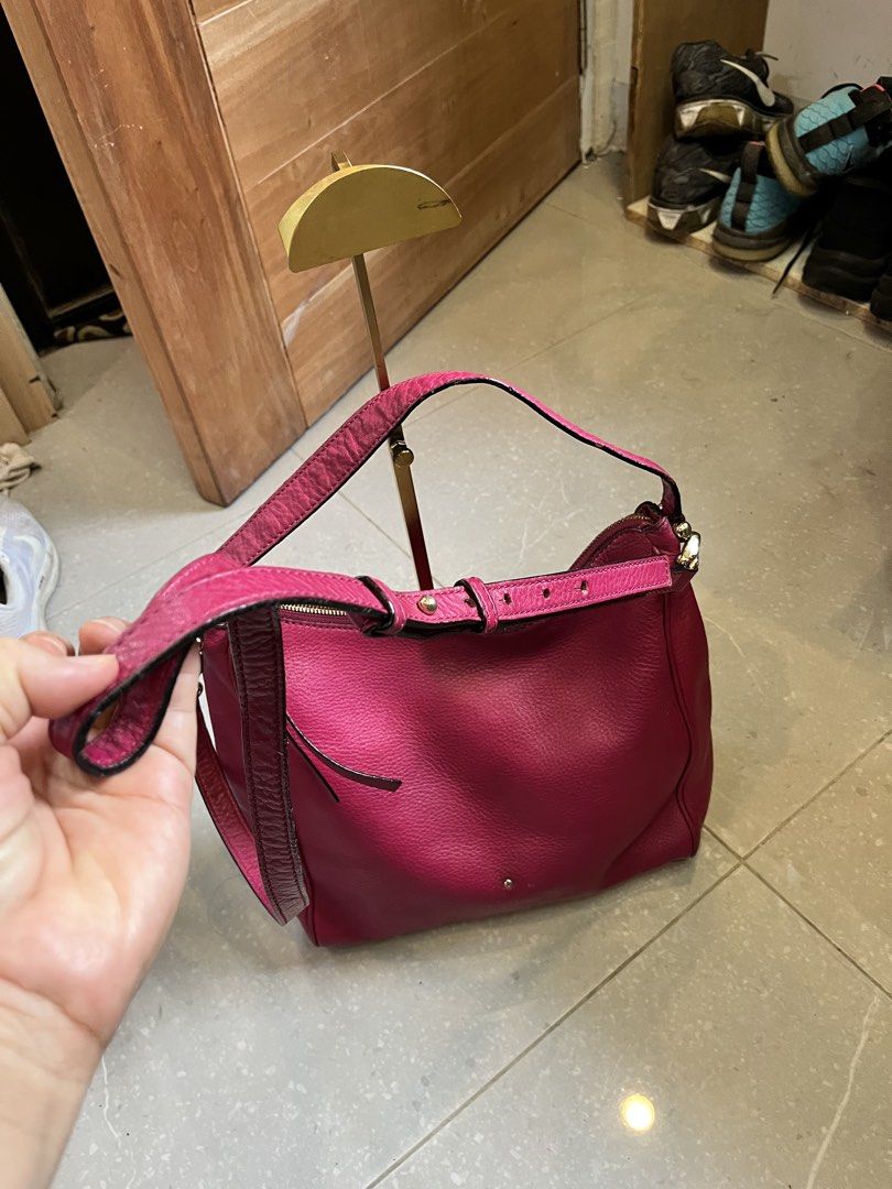 Kate Spade Pink Leather Hobo Shoulder Bag (Category: Luxury Bags & Wallets) located in Cebu City. Submitted by nbetcuban007trendyfinds (Listing ID 1450149008, Image 2). Description: - KATE Spade New York original - Stylish pink leather hobo bag - Dual carrying options: crossbody strap and top handles - Secure YKK zipper closure - Elegant gold hardware details - Spacious interior, ideal for everyday essentials - Shows some signs of wear on the str