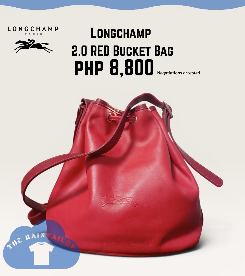 Longchamp 2.0 Drawstring Bucket Bag (Category: Luxury Bags & Wallets) located in Baguio. Submitted by theraintailor (Listing ID 1450146173, Image 2). Description: Longchamp 2.0 Drawstring Bucket Bag in poppy red (Very rare model) (This bag is the Longchamp 2.0 drawstring bucket bag from the 2016 spring collection release, not to be confused with le pliage bucket bags, or the le foulonne grained leather bucket bag) - 2 open pockets inside and 1 wi