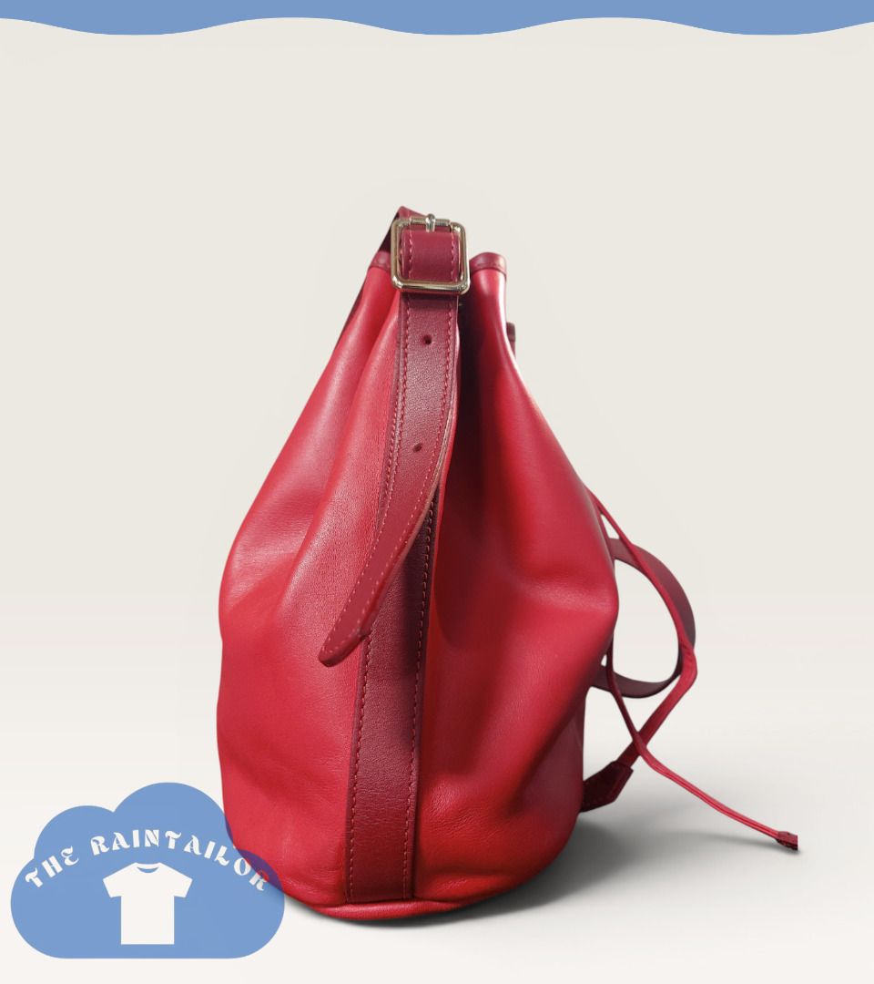 Longchamp 2.0 Drawstring Bucket Bag (Category: Luxury Bags & Wallets) located in Baguio. Submitted by theraintailor (Listing ID 1450146173, Image 3). Description: Longchamp 2.0 Drawstring Bucket Bag in poppy red (Very rare model) (This bag is the Longchamp 2.0 drawstring bucket bag from the 2016 spring collection release, not to be confused with le pliage bucket bags, or the le foulonne grained leather bucket bag) - 2 open pockets inside and 1 wi