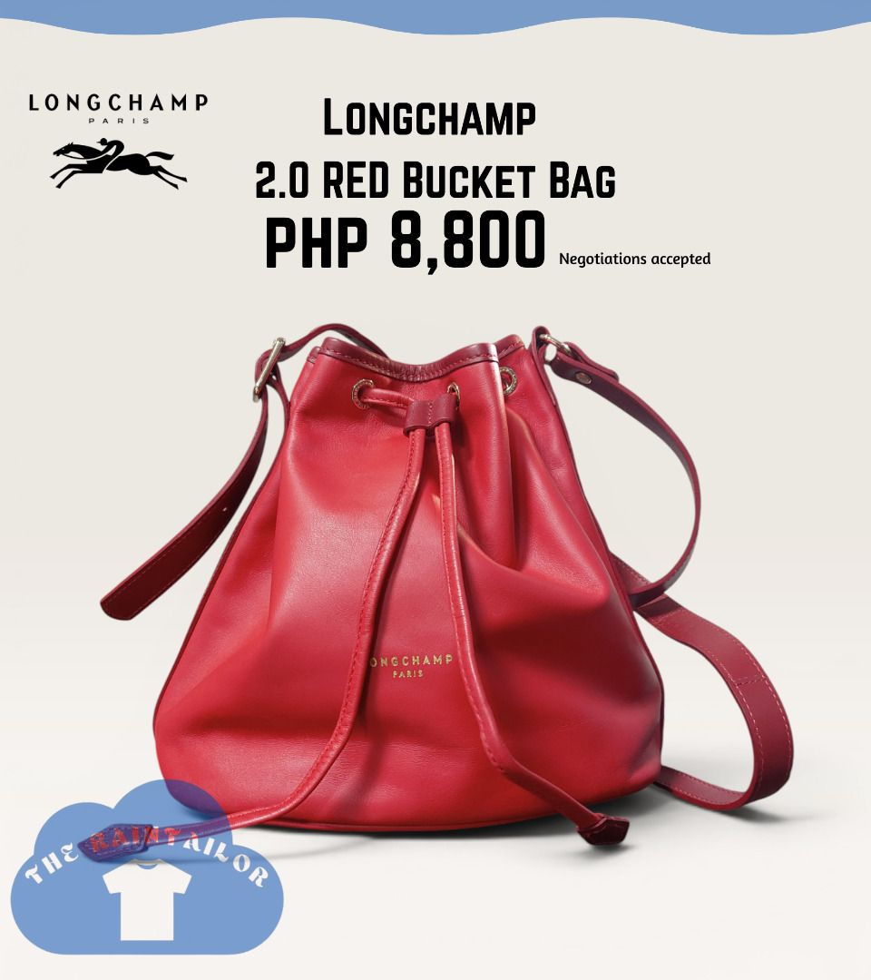 Longchamp 2.0 Drawstring Bucket Bag (Category: Luxury Bags & Wallets) located in Baguio. Submitted by theraintailor (Listing ID 1450146173, Image 1). Description: Longchamp 2.0 Drawstring Bucket Bag in poppy red (Very rare model) (This bag is the Longchamp 2.0 drawstring bucket bag from the 2016 spring collection release, not to be confused with le pliage bucket bags, or the le foulonne grained leather bucket bag) - 2 open pockets inside and 1 wi