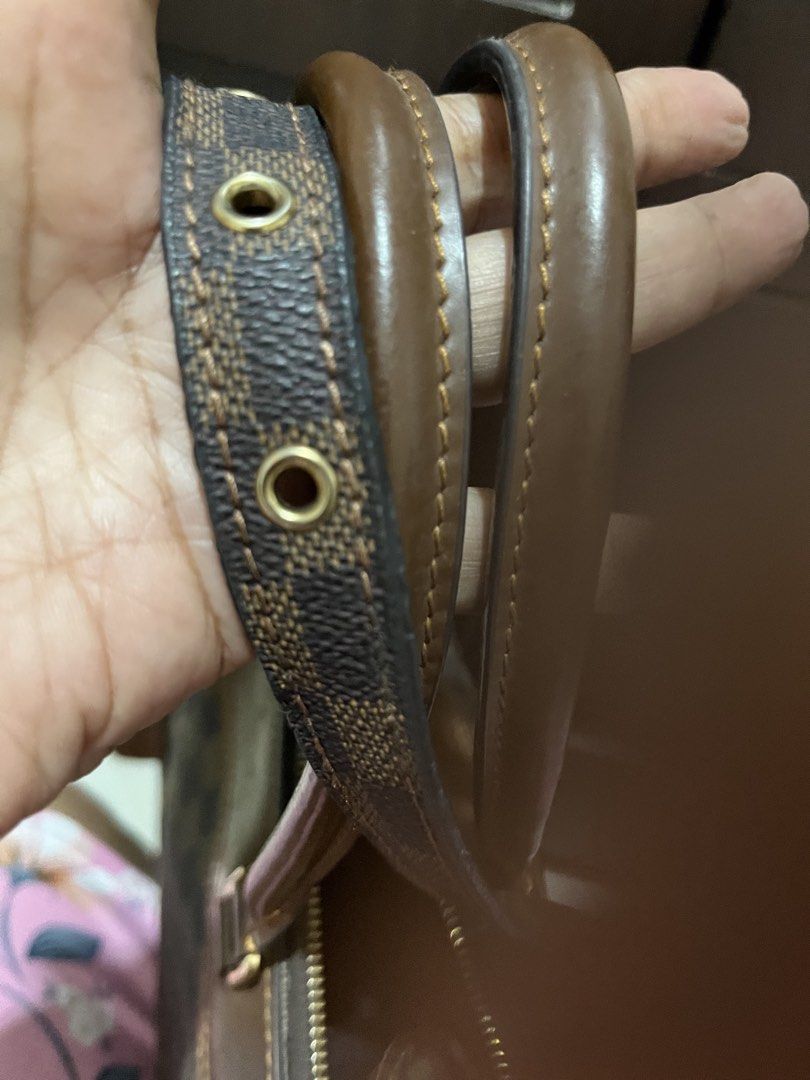 Louis Vuitton Damier Ebene Speedy 30 Handbag (Category: Luxury Bags & Wallets) located in Manila. Submitted by silvereagle_0d6c7c (Listing ID 1450190197, Image 2). Description: - Authentic Louis Vuitton Speedy 30 - Damier Ebene canvas (classic brown checkered pattern) - Genuine leather handles and trim - Secure zipper closure - Includes detachable shoulder strap - Vibrant red interior - Perfect everyday bag - Minor signs of wear on leather trim a
