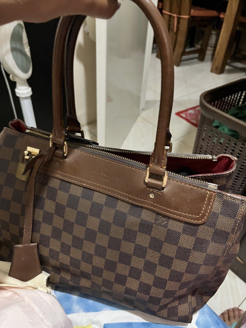 Louis Vuitton Damier Ebene Speedy 30 Handbag (Category: Luxury Bags & Wallets) located in Manila. Submitted by silvereagle_0d6c7c (Listing ID 1450190197, Image 1). Description: - Authentic Louis Vuitton Speedy 30 - Damier Ebene canvas (classic brown checkered pattern) - Genuine leather handles and trim - Secure zipper closure - Includes detachable shoulder strap - Vibrant red interior - Perfect everyday bag - Minor signs of wear on leather trim a