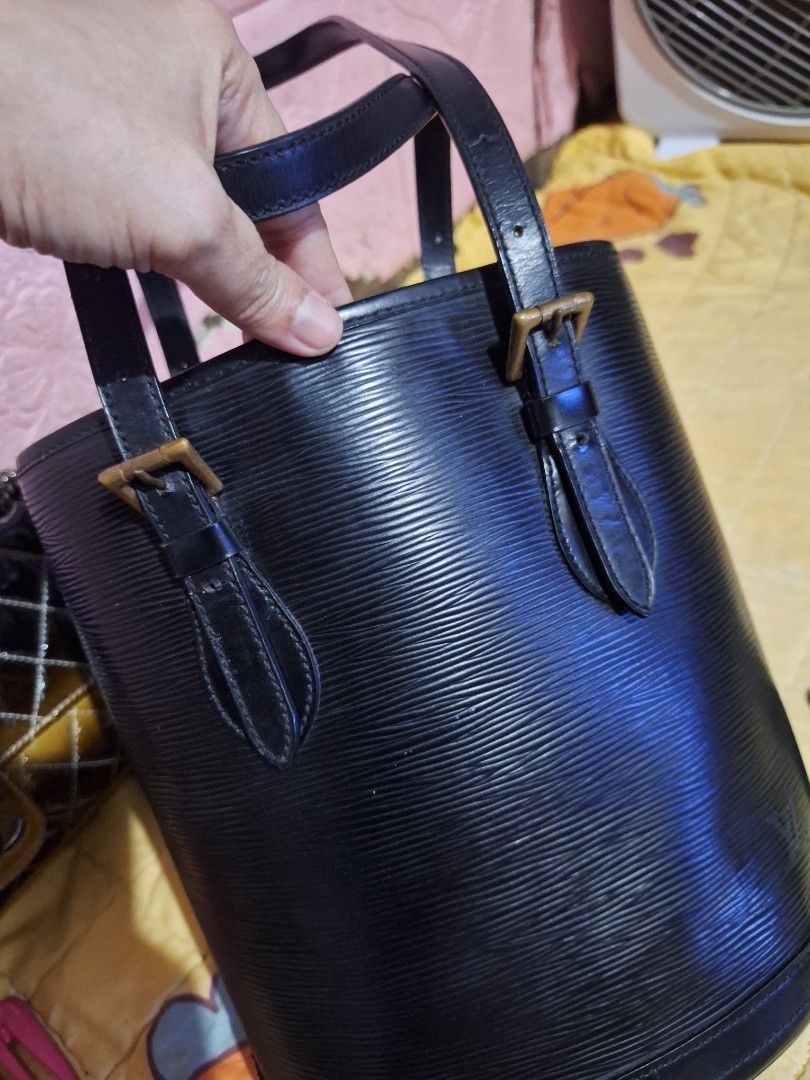 Louis Vuitton Epi Leather Bucket Bag (Category: Luxury Bags & Wallets) located in Quezon City. Submitted by cloudymay (Listing ID 1450166830, Image 2). Description: - Louis Vuitton bucket bag - Made from Epi leather with embossed LV monogram - Features a stylish chain strap and comfortable leather handles Preloved. Korea Source.