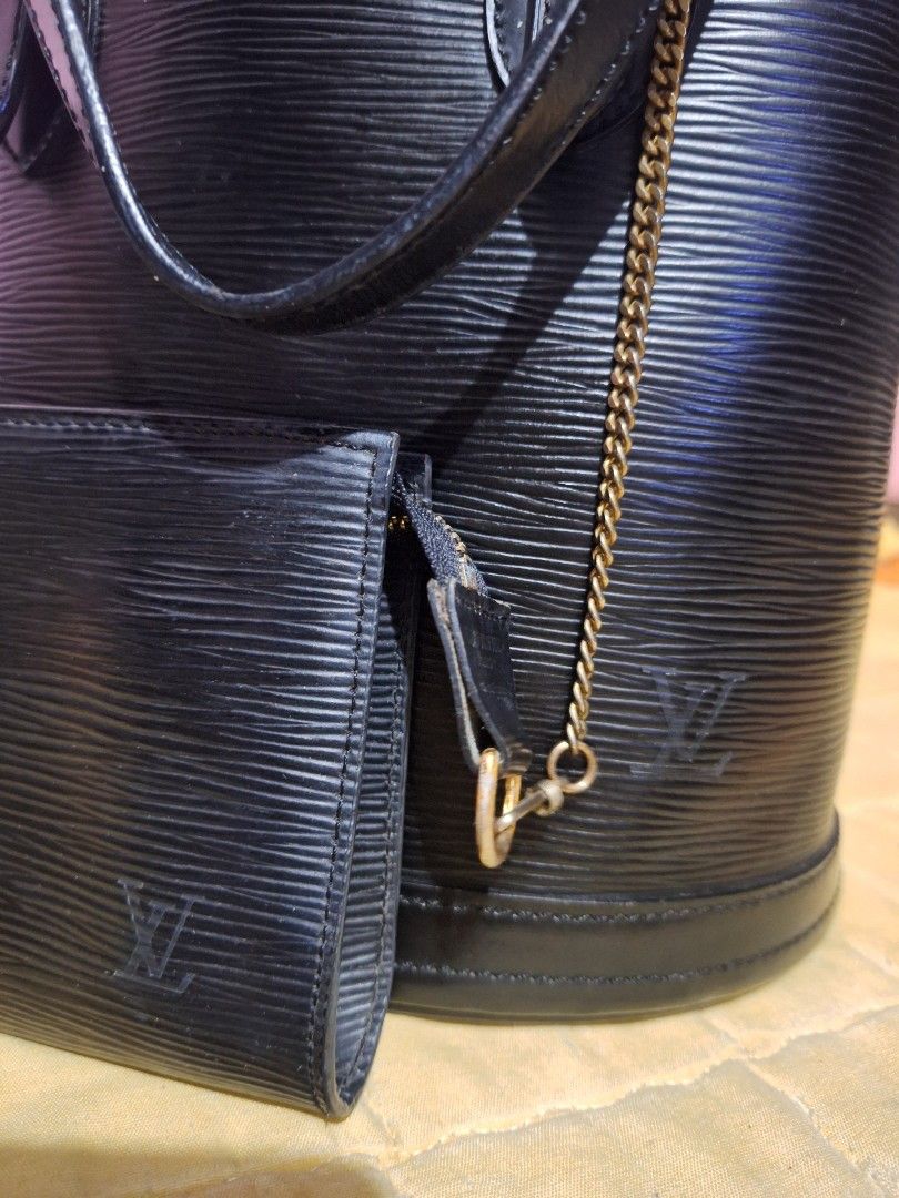 Louis Vuitton Epi Leather Bucket Bag (Category: Luxury Bags & Wallets) located in Quezon City. Submitted by cloudymay (Listing ID 1450166830, Image 1). Description: - Louis Vuitton bucket bag - Made from Epi leather with embossed LV monogram - Features a stylish chain strap and comfortable leather handles Preloved. Korea Source.