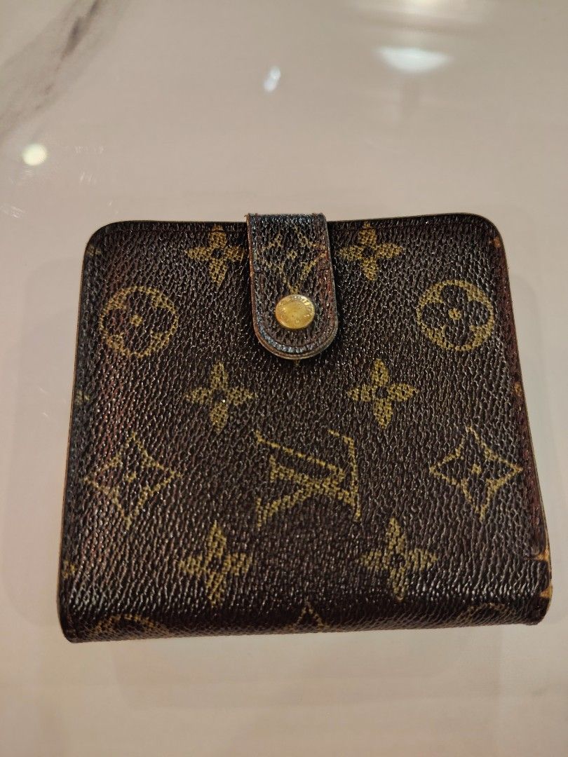 Louis Vuitton Monogram Canvas Bifold Wallet (Category: Luxury Bags & Wallets) located in Cagayan de Oro. Submitted by michaelluxuryitems (Listing ID 1450168253, Image 1). Description: - Authentic Louis Vuitton wallet - Classic monogram canvas - Snap button closure - Zippered coin pocket - Multiple card slots - Bill compartments - Timeless piece.
