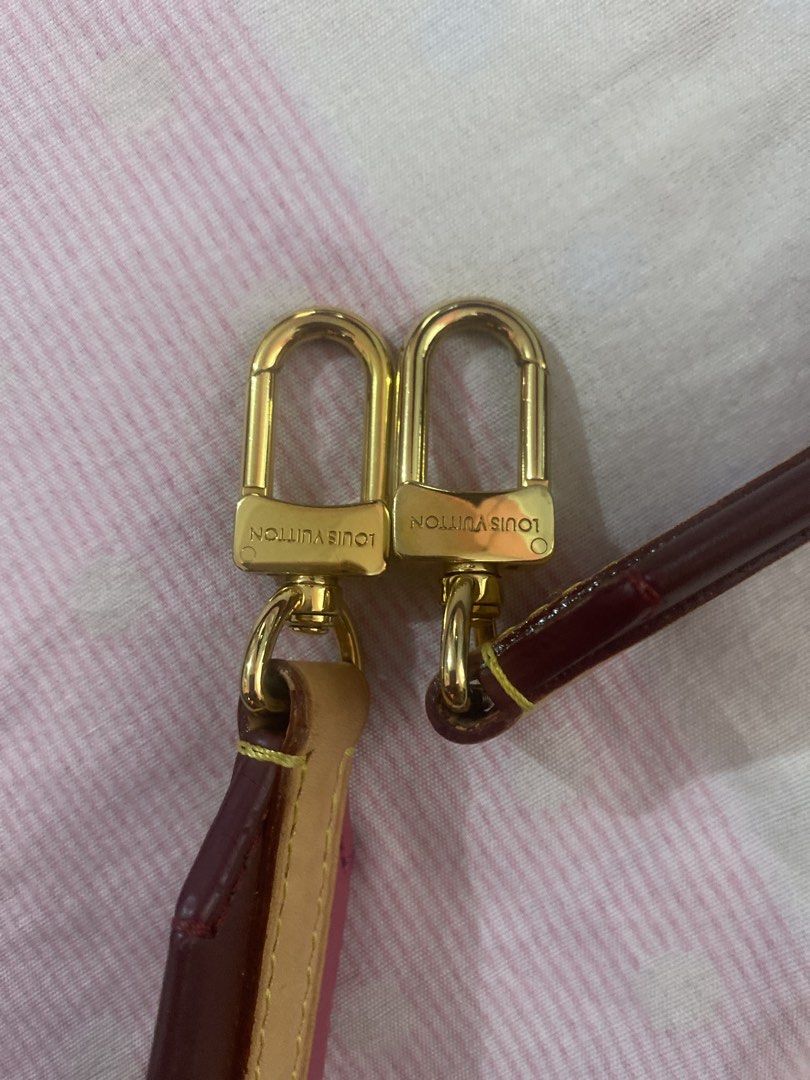 Louis Vuitton Monogram Strap Pink Burgundy Gold Hardware (Category: Luxury Bags & Wallets) located in Cagayan de Oro. Submitted by kookiegirl1975 (Listing ID 1450202767, Image 3). Description: - Authentic Louis Vuitton strap - Pink and burgundy leather mix - Gold tone hardware with LV logo - Adjustable length - Perfect for customizing your bag - Clean and ready for a new owner.
