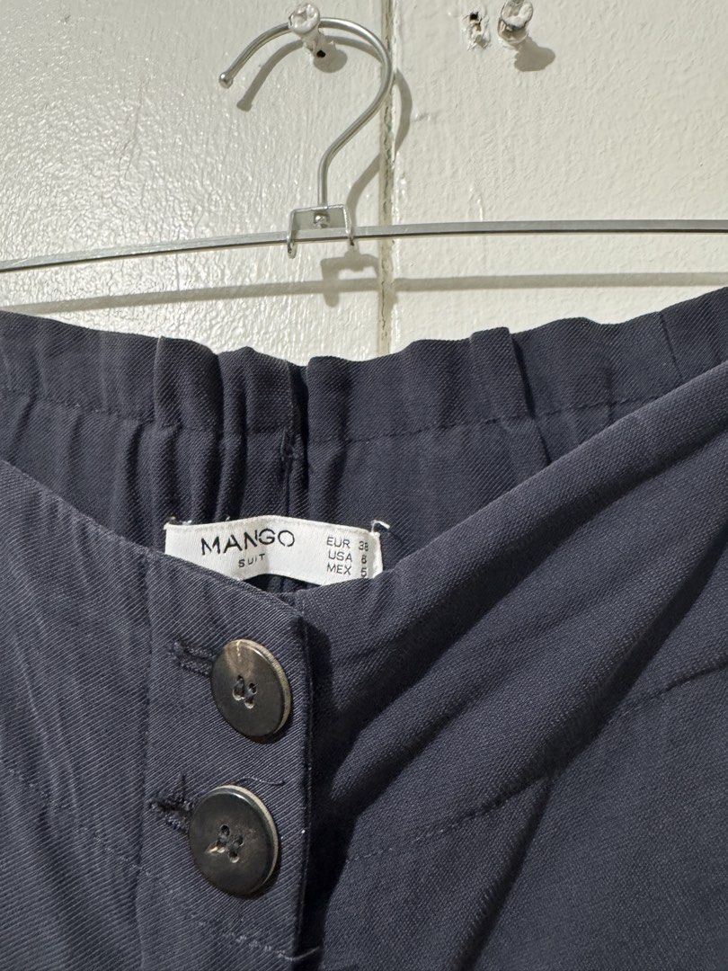 Mango Women Navy Blue Trouser Pants (Category: Other Bottoms) located in San Juan City. Submitted by charrrbr (Listing ID 1450303662, Image 2). Description: Brand: Mango Suit Color: Navy Blue Size: Eur38 (28 waist) Style: Paperbag waist, high-waisted, stretchable at the back Fit: Relaxed .