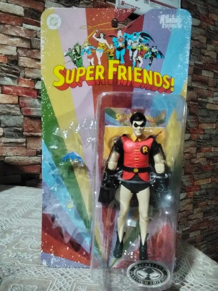 McFarlane Super Friends Evil Robin Platinum Edition (Category: Figurines & Statues) located in Caloocan City. Submitted by toystv (Listing ID 1450255166, Image 1). Description: -evil Robin action figure from the classic Super Friends line. - Comes sealed in its original packaging. - Includes a small blue accessory. - Packaging has minor shelf wear, but the figure inside is in excellent, sealed condition. - Ideal for collectors and fans of vintage