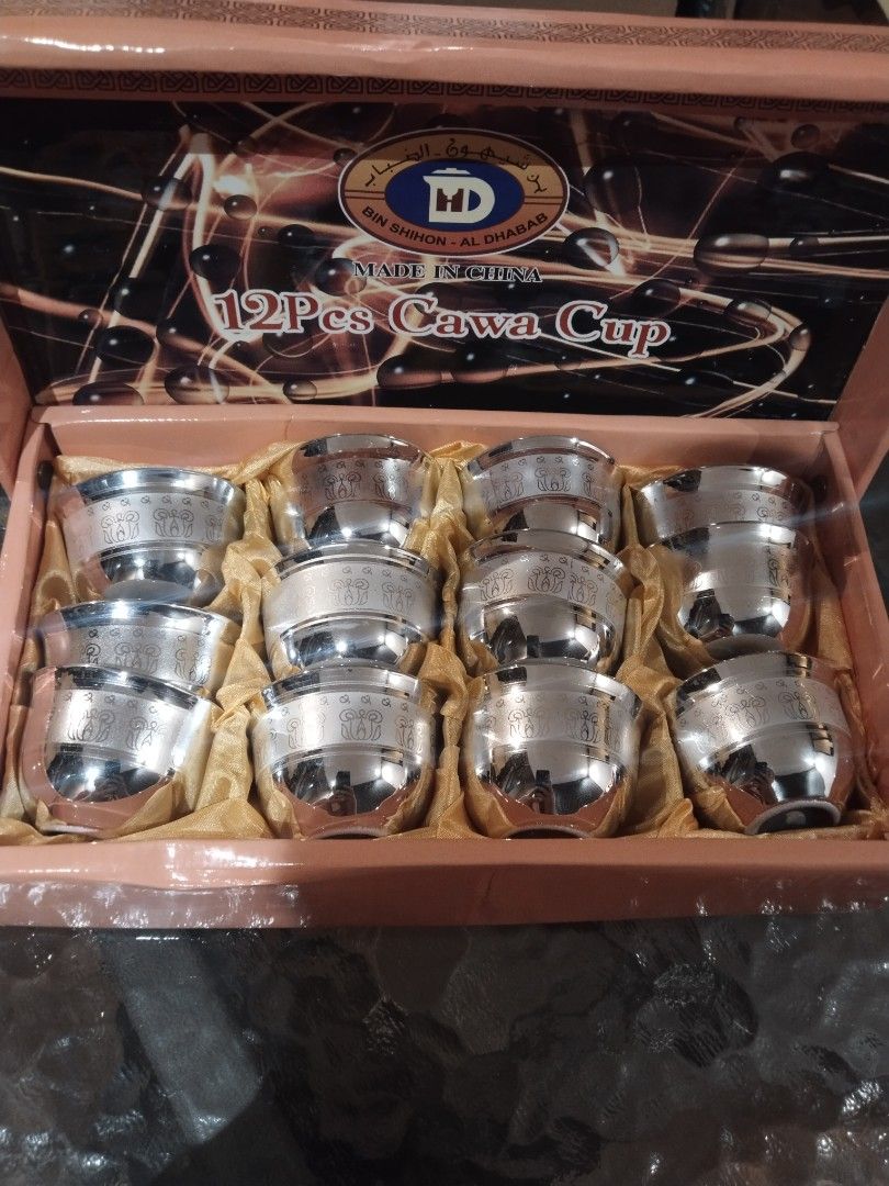MD 12 Pcs Cawa Cup Set Made in China (Category: Coffee & Tea Tableware) located in Trece Martires City. Submitted by joannequin50934 (Listing ID 1450283128, Image 2). Description: - Set of 12 Cawa cups - Elegant silver color with intricate detailing - Includes a decorative box with a nice design - Ideal for serving coffee or tea - Made in China.