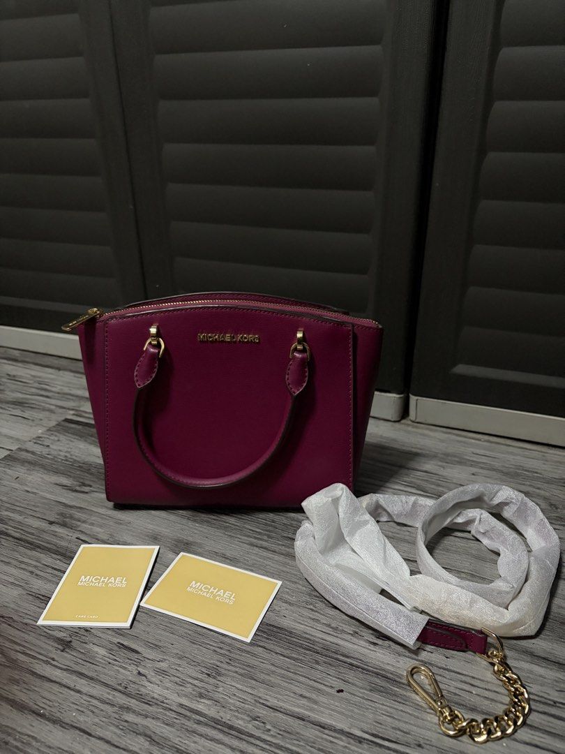 Michael Kors Selma Handbag Medium (Category: Luxury Bags & Wallets) located in Manila. Submitted by angelrose0210 (Listing ID 1450222037, Image 3). Description: - Michael Kors handbag - Deep berry color - Gold hardware details - Top handles - Detachable crossbody strap - Interior zip pocket - Comes with authenticity cards - Versatile for everyday or special occasions.