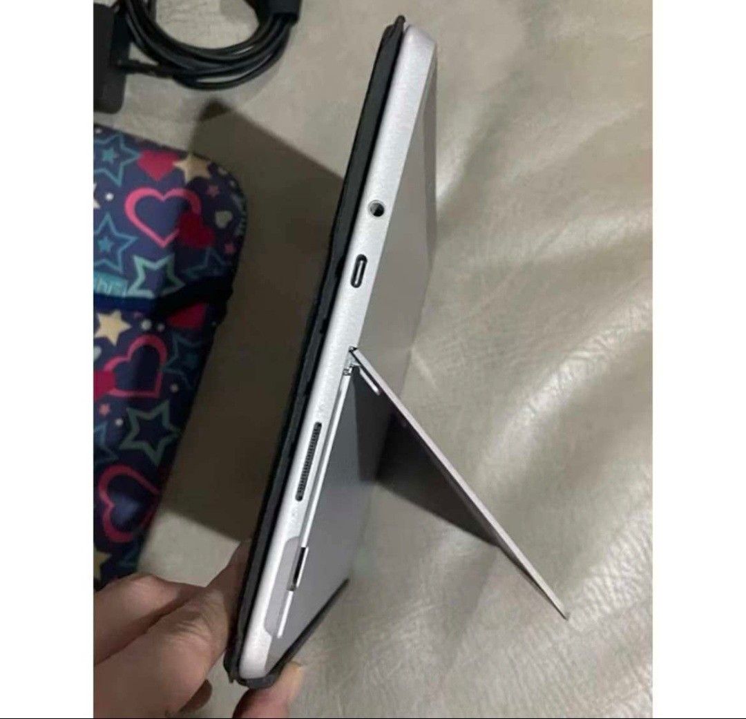 MICROSOFT SURFACE GO 10" LAPTOP TABLET, SILVER-64GB (Category: Laptops & Notebooks) located in Quezon City. Submitted by stuffiesetc (Listing ID 1450171122, Image 3). Description: MICROSOFT SURFACE GO 10" LAPTOP TABLET, SILVER-64GB Guaranteed authentic. New demo unit but in very good condition. No deep scratches, no functional defects. Used mainly just for store demo and display. Bought originally for about Php45,000. Product details -laptop with