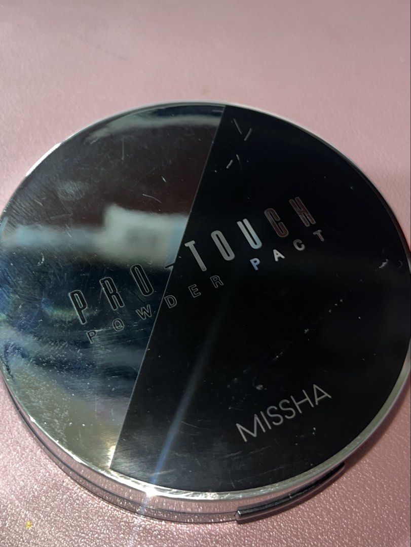 MISSHA Magic Cushion & Pro-Touch Powder Pact (Category: Makeup) located in Pasig City. Submitted by thertins (Listing ID 1450256532, Image 3). Description: - MISSHA Magic Cushion Cover Lasting (Shade No. 21) - White compact with mirror - MISSHA Pro-Touch Powder Pact - Silver and black compact - Ideal for quick touch-ups anytime, anywhere - Achieve a smooth, lasting finish Bundle 2 for 500.