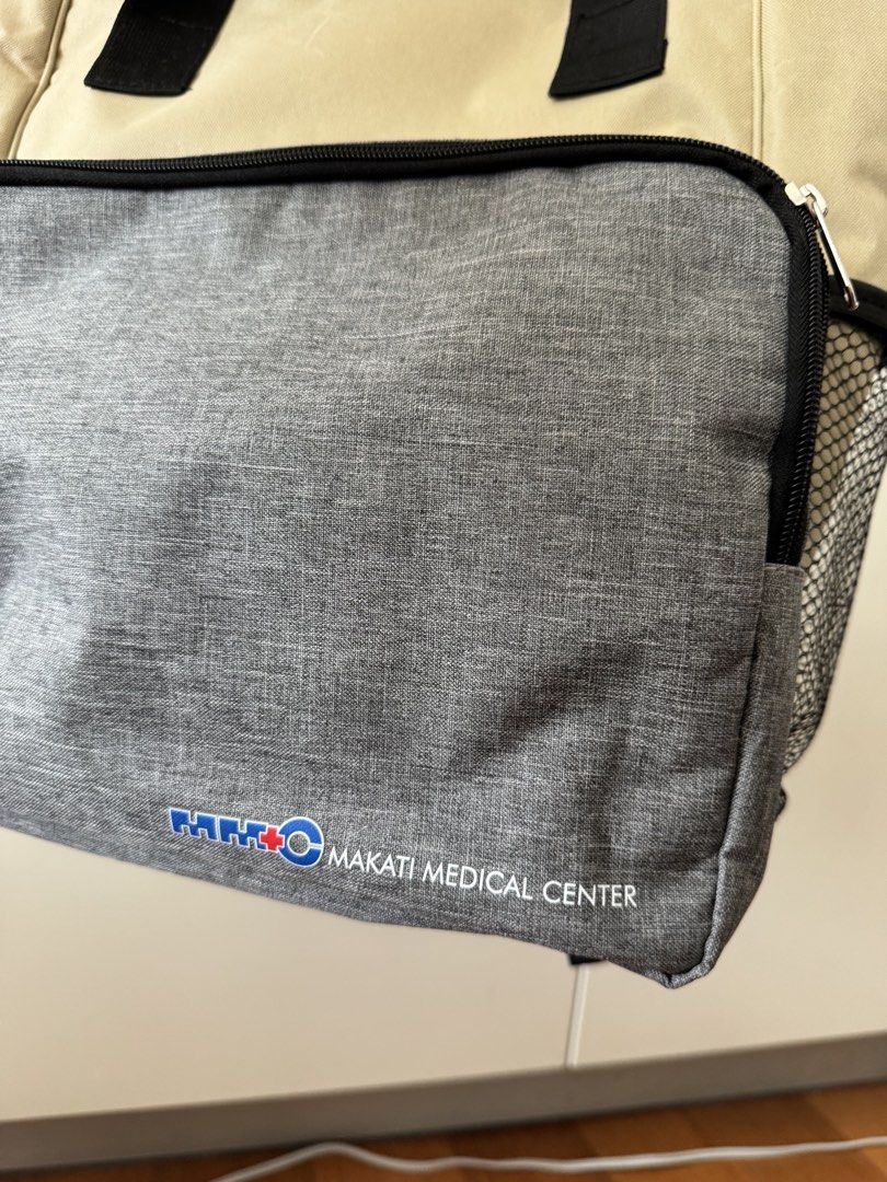 MMC Diaper Bag (Backpack) (Category: Diaper Bags & Wetbags) located in Mandaluyong City. Submitted by grmnk (Listing ID 1450318110, Image 2). Description: Got this from when I gave birth at Makati Medical Center last Q1 2026. Includes a padded diaper changing mat! RFS: We already have an existing backpack and this only takes space in our small condo. BPI / GCash Grab / Lalamove pick-up from Mandaluyong.