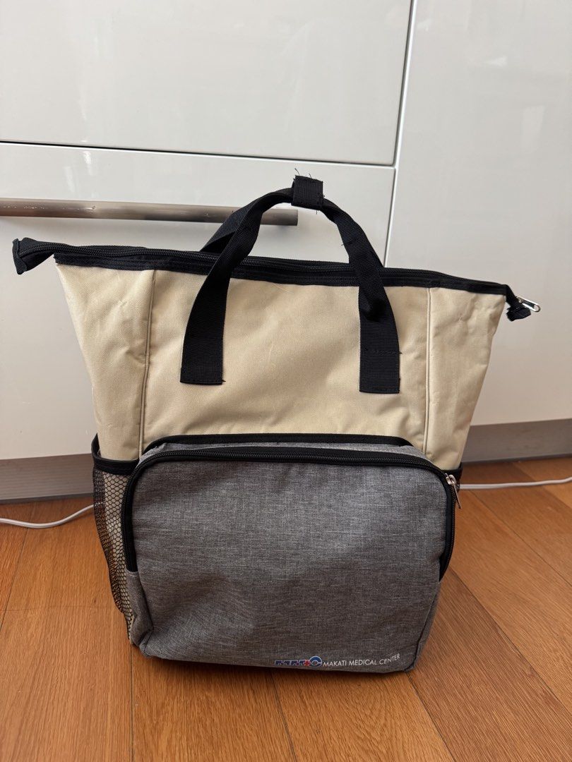 MMC Diaper Bag (Backpack) (Category: Diaper Bags & Wetbags) located in Mandaluyong City. Submitted by grmnk (Listing ID 1450318110, Image 1). Description: Got this from when I gave birth at Makati Medical Center last Q1 2026. Includes a padded diaper changing mat! RFS: We already have an existing backpack and this only takes space in our small condo. BPI / GCash Grab / Lalamove pick-up from Mandaluyong.