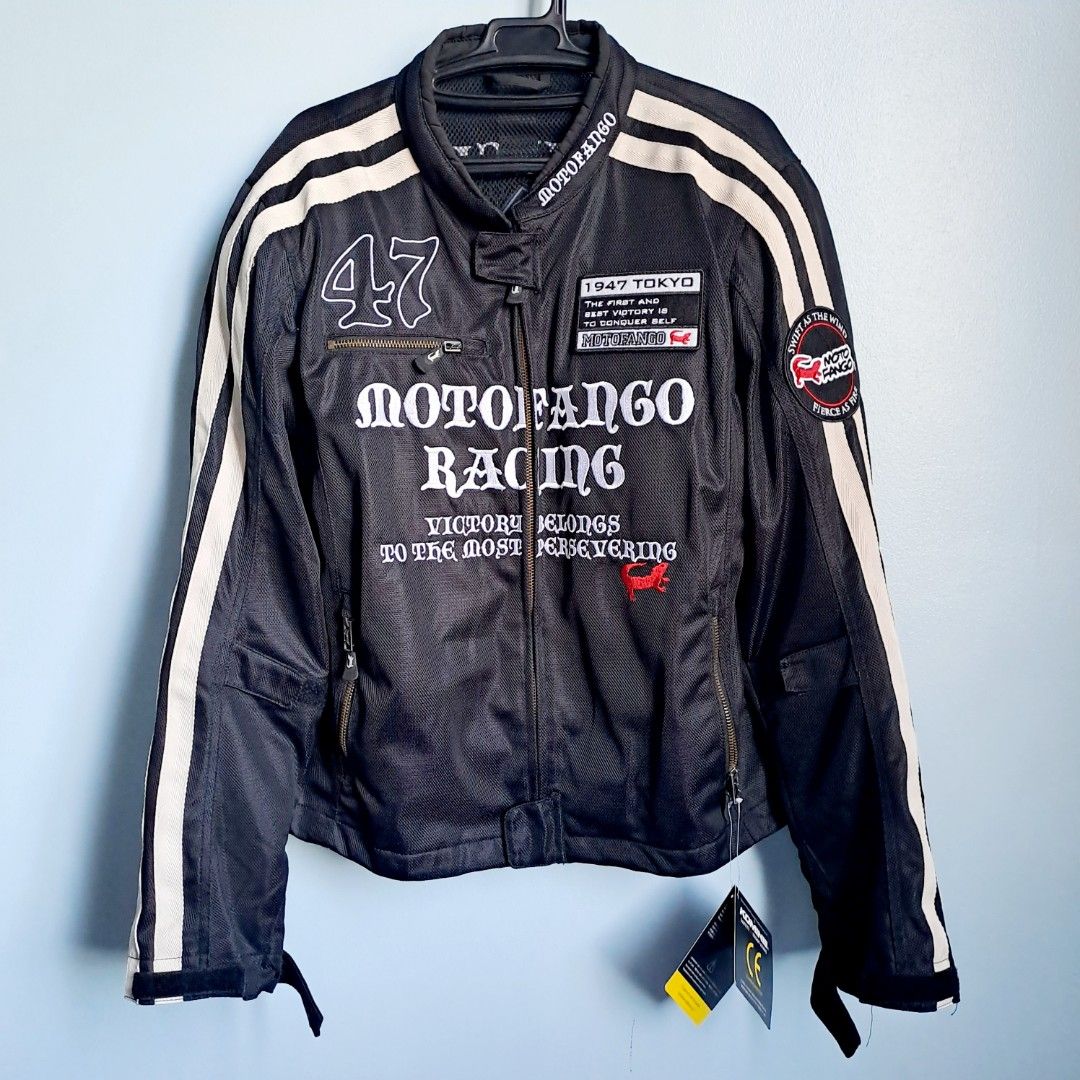 Motofango Racing Motorcycle Jacket CE Approved Protectors (Category: Coats, Jackets and Outerwear) located in Manila. Submitted by moccayap23686 (Listing ID 1450143273, Image 2). Description: - Motofango Racing Jacket - Size: L - Color: Black with white and cream racing stripes - Graphics: 'Invincible' and 'Motofango Racing' on back and front - Protection: CE approved protectors by Komine - Ideal for: Riding - never used.