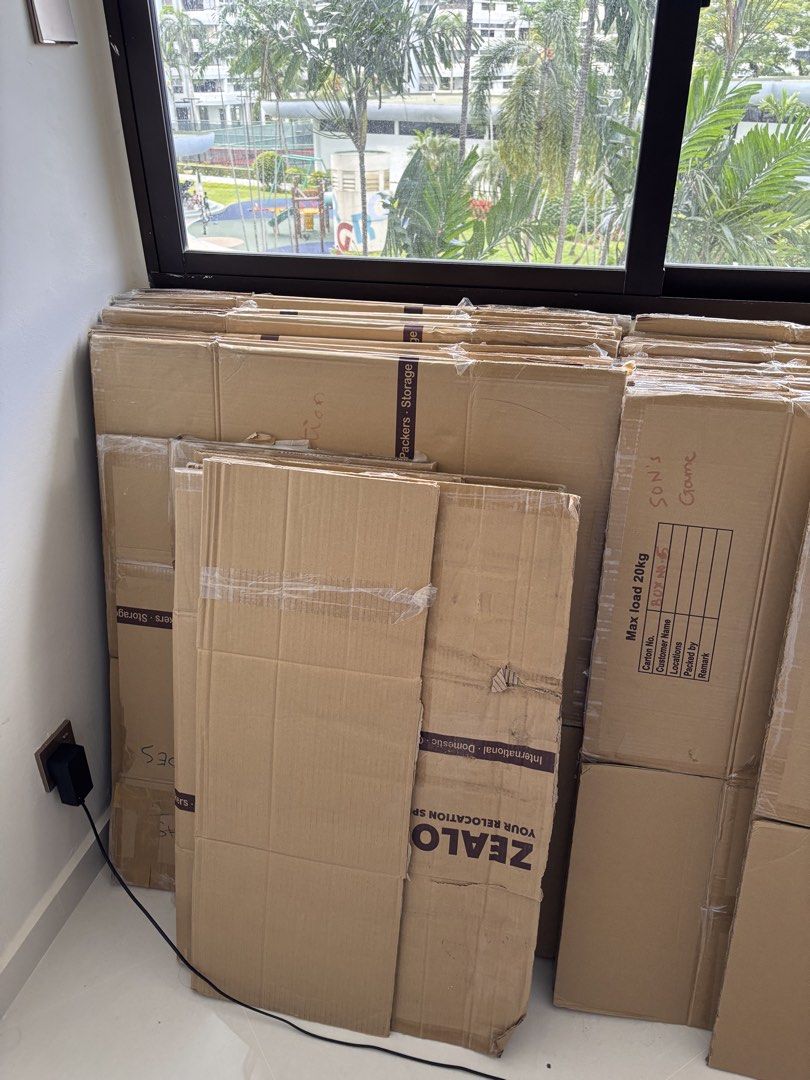 Moving Boxes (Category: Storage Boxes & Baskets) located in Singapore. Submitted by Whiteknight (Listing ID 1450149783, Image 1). Description: - Stack of moving boxes available - Suitable for storage or moving house - Various sizes included - Some boxes may have labels - Limited stock, buy now! - I have got approx 40-50 boxes take all for $50 or each one for $2.