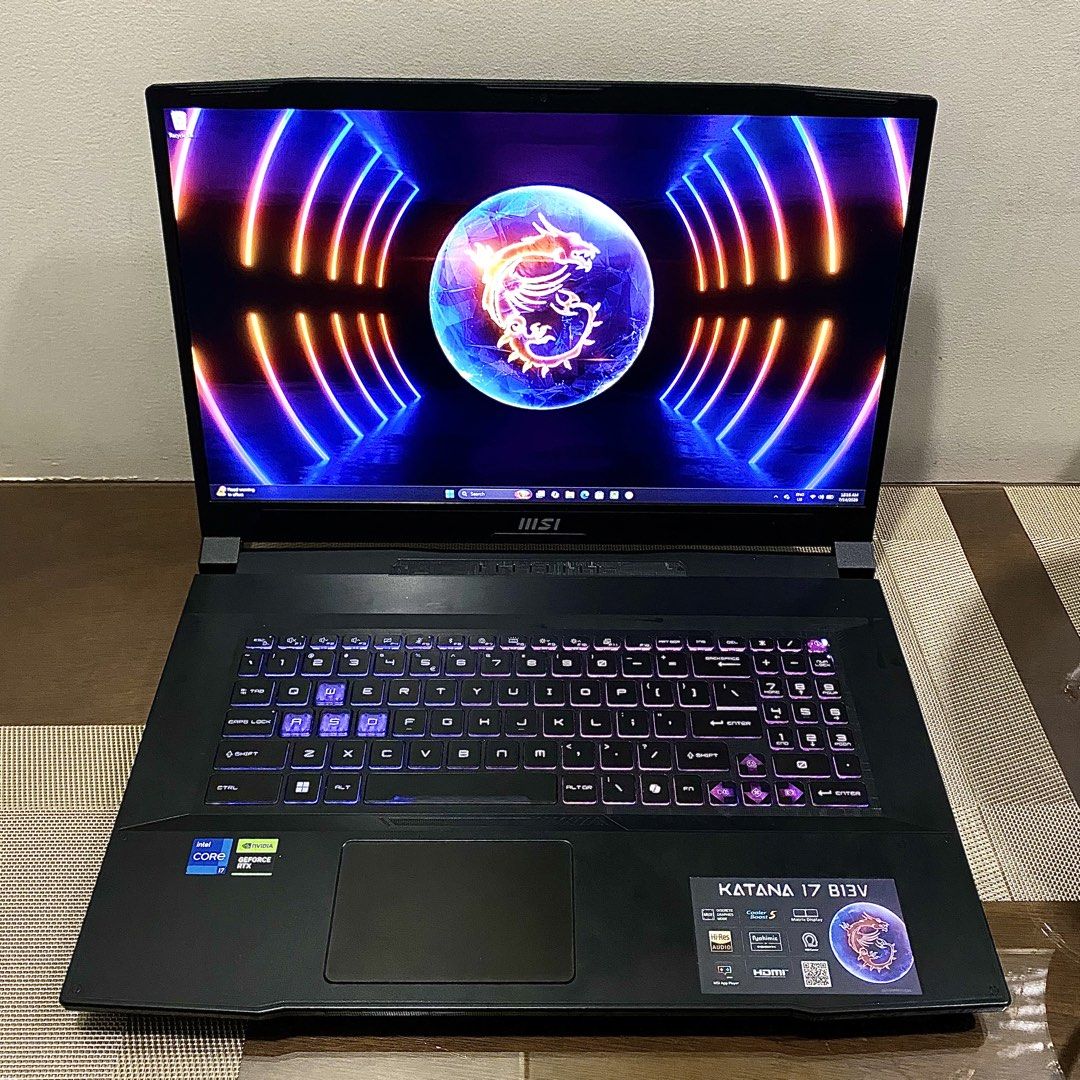 MSI Katana 17 B13V Gaming Laptop (Category: Laptops & Notebooks) located in Malabon City. Submitted by kridcollections (Listing ID 1450239178, Image 3). Description: Specs: - Intel i7-13620H (13th Gen) - NVIDIA RTX 4050 (6GB) - 16GB RAM (fast 5200 MHz) - 512GB SSD - 17.3” Display (large screen, great for multitasking & design) Condition: - Well maintained - No issues, makinis and no dents - Personal unit (not buy & sell) Inclusions: - Original ch