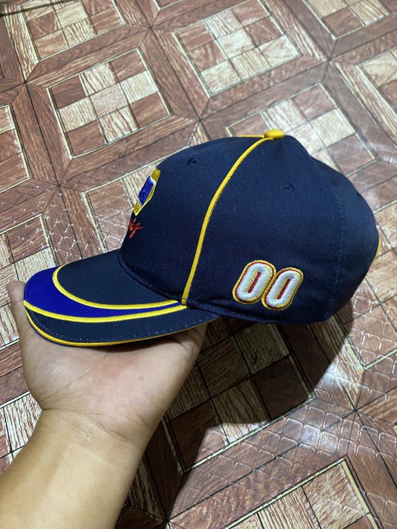 NAPA Racing NASCAR Embroidered Baseball Cap (Category: Caps & Hats) located in Puerto Princesa. Submitted by earlpogitrhift (Listing ID 1450283588, Image 2). Description: - Navy blue NAPA Racing cap - Features NAPA logo and 'Racing' text on the front - NASCAR logo on the side - Embroidered '00' on the side and back - Adjustable strap for a comfortable fit - Ideal for any racing fan.