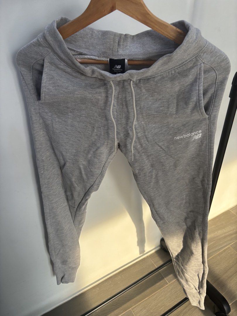 New Balance Grey Jogger Sweatpants (Category: Other Bottoms) located in Mandaue City. Submitted by offthehanger26 (Listing ID 1450189587, Image 1). Description: - Includes drawstring and cuffed ankles - Ideal for lounging or workouts.