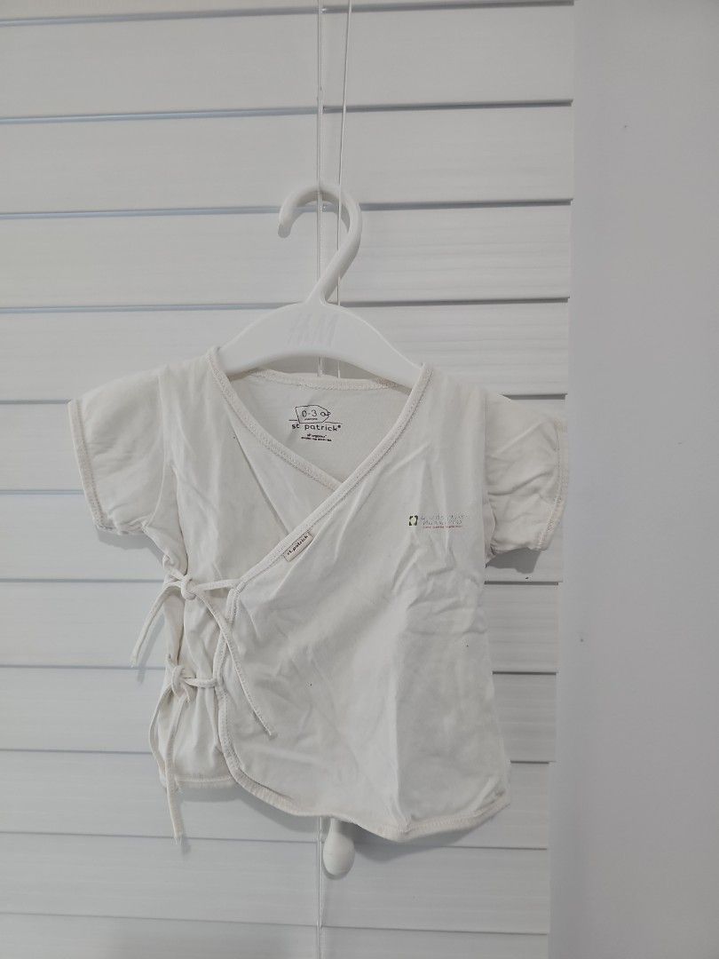 Newborn St. Patrick Baby Wrap Top with Tie Closure (Category: Babies & Kids Fashion) located in Carmona. Submitted by boramartph (Listing ID 1450229373, Image 1). Description: With faded asian hospital design For newborn RFS: Outgrown and decluttering.