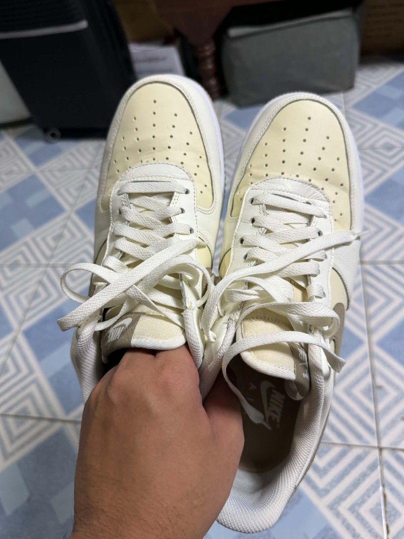Nike Air Force 1 Low Cream Brown (Category: Sneakers) located in San Fernando. Submitted by thrifttt.ph (Listing ID 1450297850, Image 3). Description: - Classic Nike Air Force 1 Low - Colorway: Cream and light yellow upper with brown accents - Features: Gum sole detail - Origin: Made in Indonesia - Ideal for: Everyday wear.