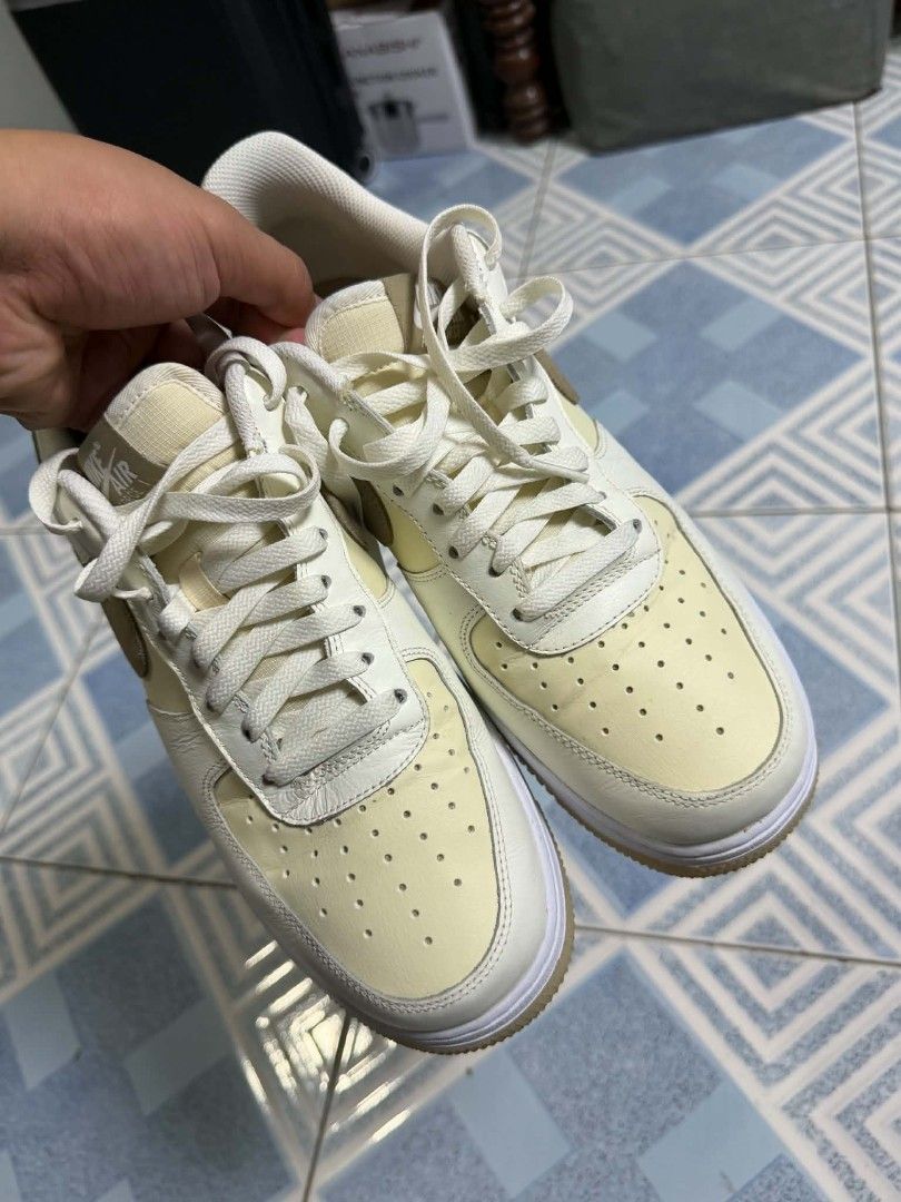 Nike Air Force 1 Low Cream Brown (Category: Sneakers) located in San Fernando. Submitted by thrifttt.ph (Listing ID 1450297850, Image 2). Description: - Classic Nike Air Force 1 Low - Colorway: Cream and light yellow upper with brown accents - Features: Gum sole detail - Origin: Made in Indonesia - Ideal for: Everyday wear.