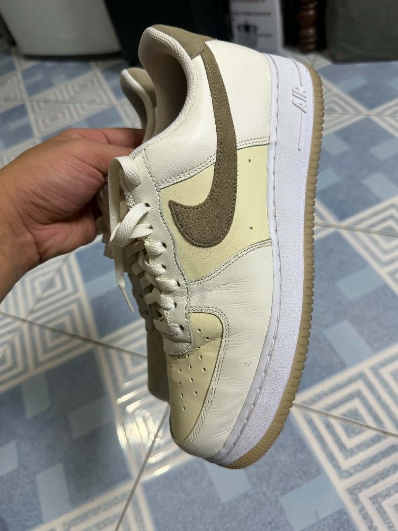 Nike Air Force 1 Low Cream Brown (Category: Sneakers) located in San Fernando. Submitted by thrifttt.ph (Listing ID 1450297850, Image 1). Description: - Classic Nike Air Force 1 Low - Colorway: Cream and light yellow upper with brown accents - Features: Gum sole detail - Origin: Made in Indonesia - Ideal for: Everyday wear.