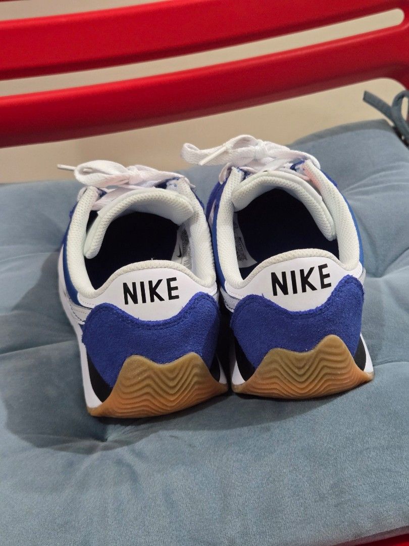 Nike Pacific Blue and White Running Sneakers (Category: Sneakers) located in Rizal. Submitted by marrenkeithly (Listing ID 1450210065, Image 3). Description: - Classic Nike running sneakers - Blue and white colorway - White laces - Gum sole detail - Ideal for casual wear or light training - Comfortable and stylish - used only once but just to fit - size is 6.5.