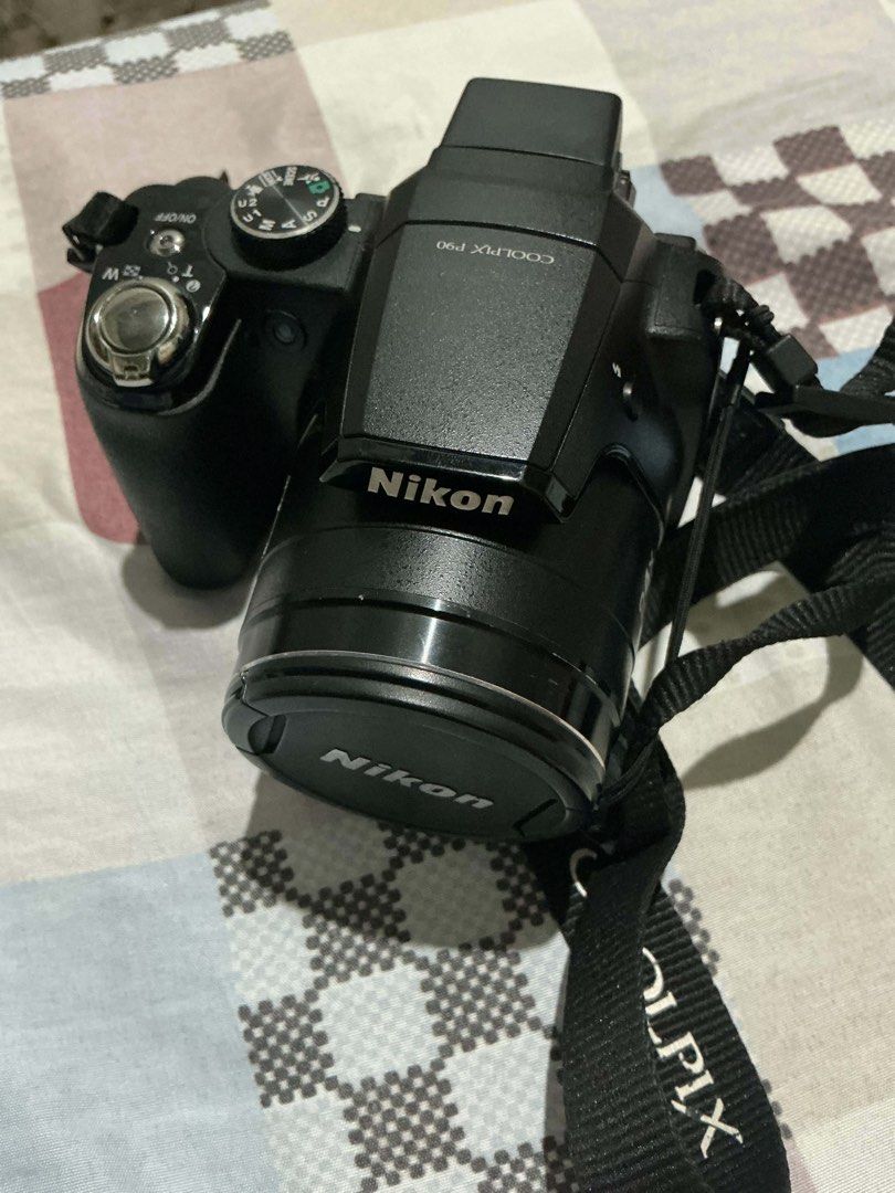 Nikon COOLPIX P90 Digital Camera with Strap (Category: Cameras) located in Vintar. Submitted by layla.ly (Listing ID 1450268332, Image 2). Description: FOR SALE‼️ Nikon Coolpix P90 ₱7500 (negotiable) + sf MOP: GCASH/GOTYME ONLY MOD: JNT -12.1 MP CCD sensor -24x optical zoom lens (26-624mm equivalent) -3-inch tilting LCD Cosmetics: 10/10 LCD: 10/10 Fuction: 9/10 Sample shots are seen in the last photos INCLUSIONS: - Original Nikon battery - Newly 