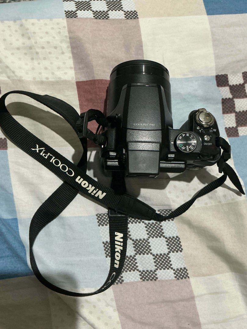 Nikon COOLPIX P90 Digital Camera with Strap (Category: Cameras) located in Vintar. Submitted by layla.ly (Listing ID 1450268332, Image 3). Description: FOR SALE‼️ Nikon Coolpix P90 ₱7500 (negotiable) + sf MOP: GCASH/GOTYME ONLY MOD: JNT -12.1 MP CCD sensor -24x optical zoom lens (26-624mm equivalent) -3-inch tilting LCD Cosmetics: 10/10 LCD: 10/10 Fuction: 9/10 Sample shots are seen in the last photos INCLUSIONS: - Original Nikon battery - Newly 