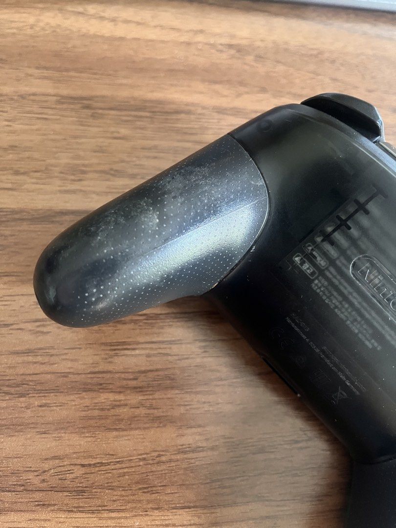 Nintendo Switch Pro Controller - Black (Category: Controllers) located in Makati City. Submitted by hvbris (Listing ID 1450200411, Image 3). Description: LAST PRICE - Nintendo Switch Pro Controller - Color: Black - Condition: Used, with minor scuffs and dust on grips/buttons from normal use - Functionality: Works great on the Switch & PC. No ghost touch. No box, no cord..