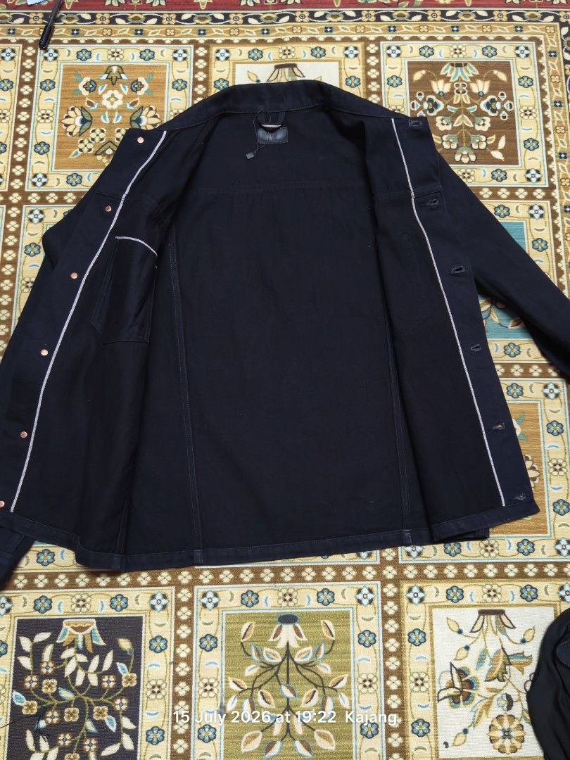 Nudie Selvage Jeans Ronny Dry Black Denim Jacket (Category: Coats, Jackets and Outerwear) located in Kajang. Submitted by .azzu (Listing ID 1450205862, Image 2). Description: - Nudie Jeans Ronny Jacket - Color: Dry Black Selvage - Material: 100% Cotton - Features: Button-up front, chest pocket - Style: Classic denim jacket, perfect for layering - Origin: Made in Romania Post additional +8 SM atau postage DFOD ❣️💟 #Non-Refundable, #Non-Exchangeab